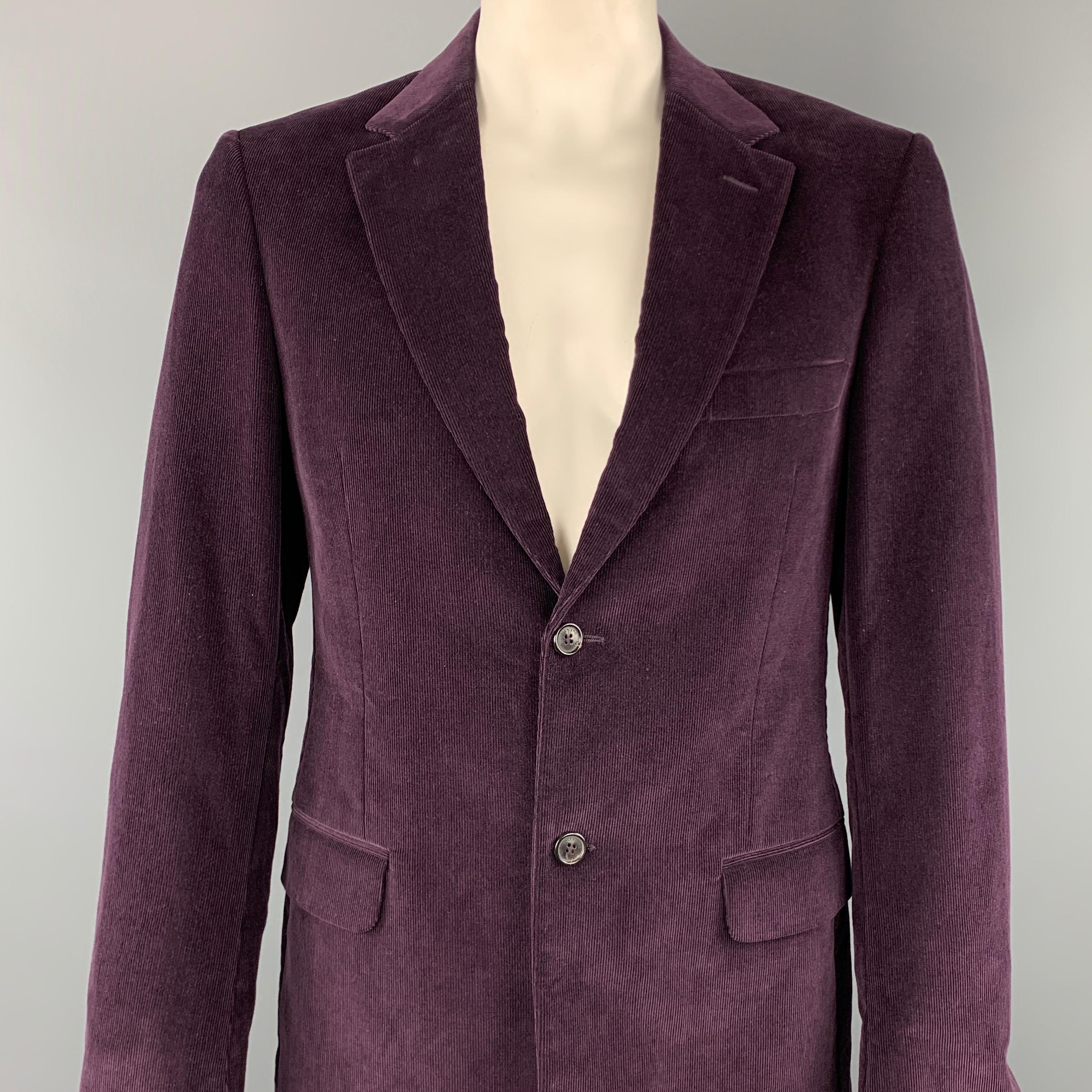 VALENTINO sport coat comes in a purple textured corduroy featuring a notch lapel, flap pockets, and a two button closure. Made in Italy.

Excellent Pre-Owned Condition.
Marked: 50

Measurements:

Shoulder: 19 in. 
Chest: 40 in. 
Sleeve: 26 in.