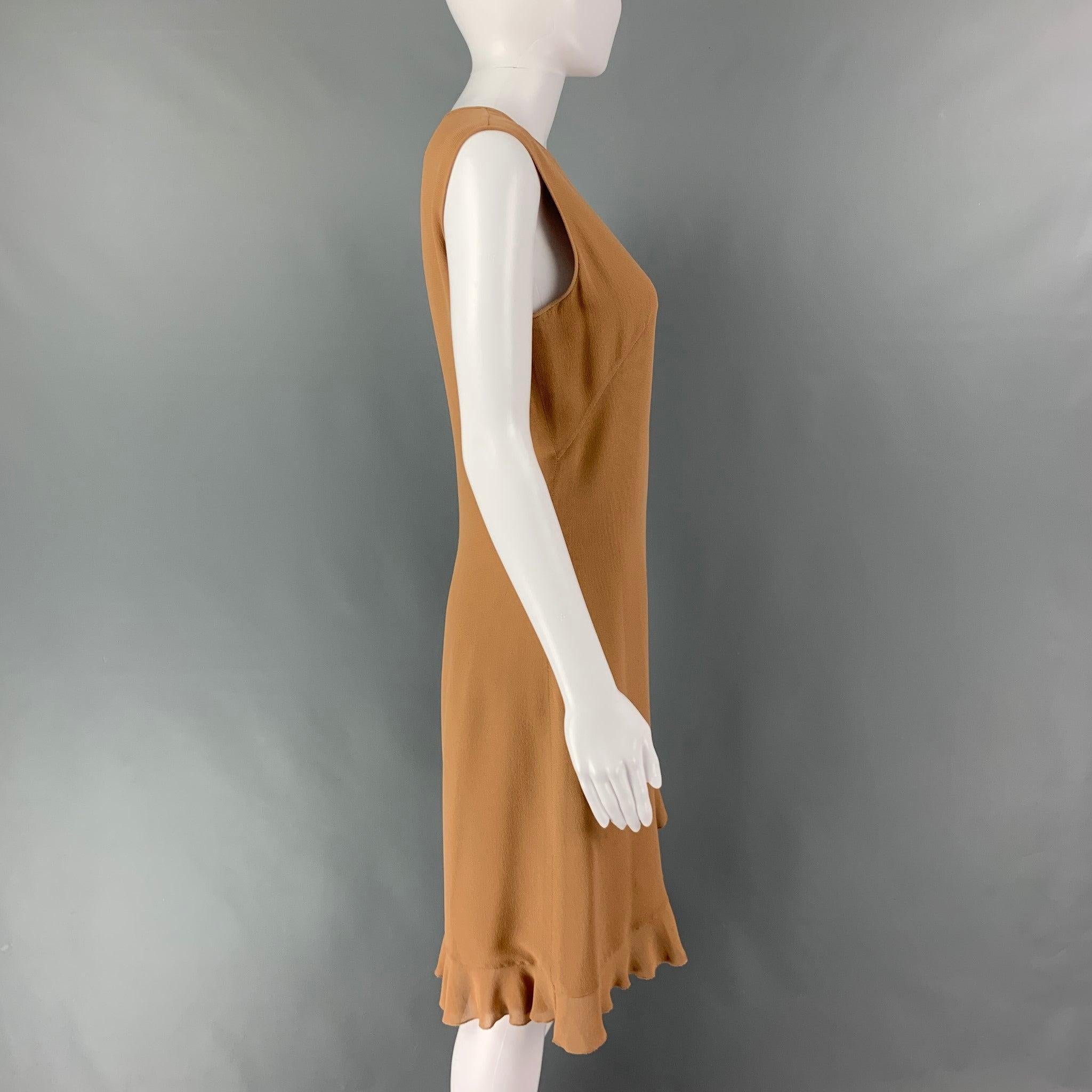 VINTAGE VALENTINO sleeveless dress comes in a tan silk featuring a shift style and ruffled detail. Made in Italy.Excellent Pre-Owned Condition. 
 

 Marked:  6 
 

 Measurements: 
  
 Shoulder: 15 inches Bust: 36 inches Hip: 38 inches Length: 37.5