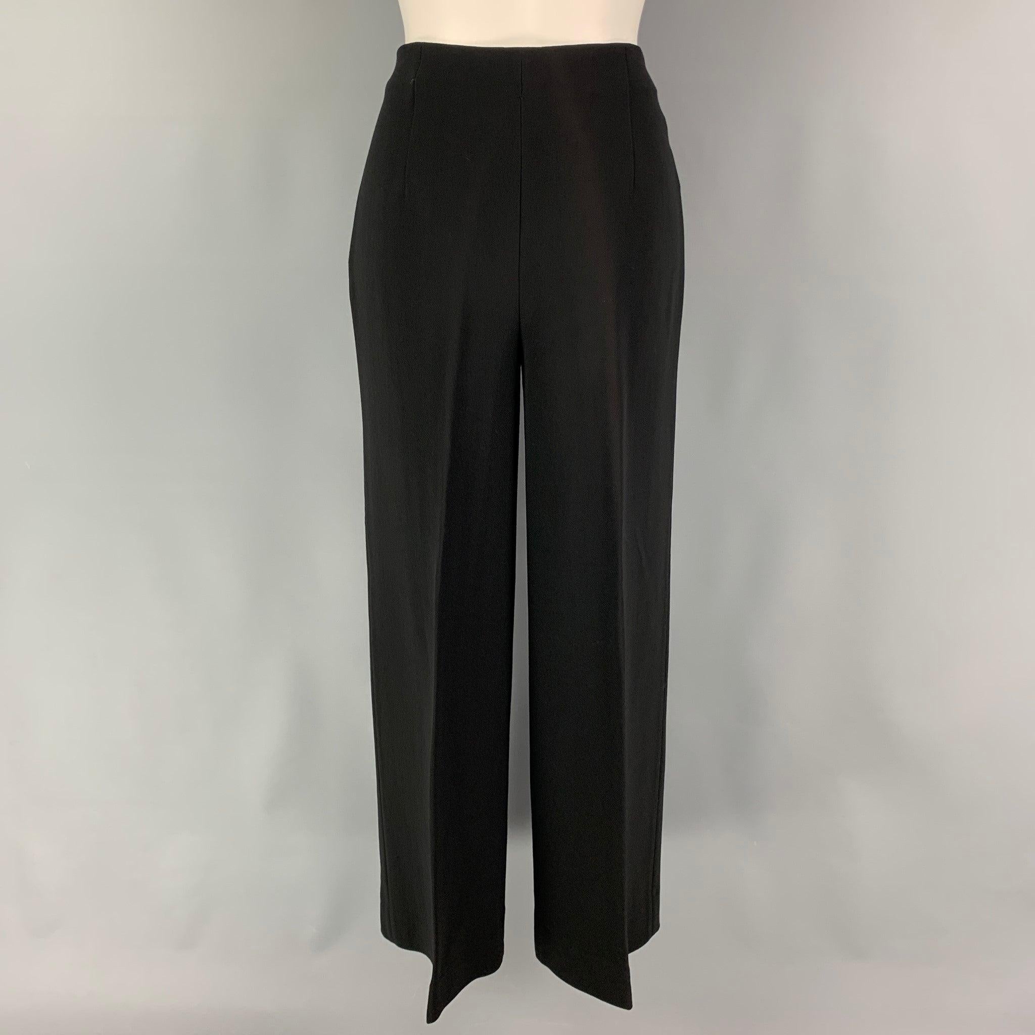 VALENTINO dress pants comes in a black viscose blend featuring a wide leg style and a side zipper closure. Made in Italy.
Excellent
Pre-Owned Condition. 

Marked:   8 

Measurements: 
  Waist: 28 inches Rise: 12 inches Inseam: 29 inches Leg Opening: