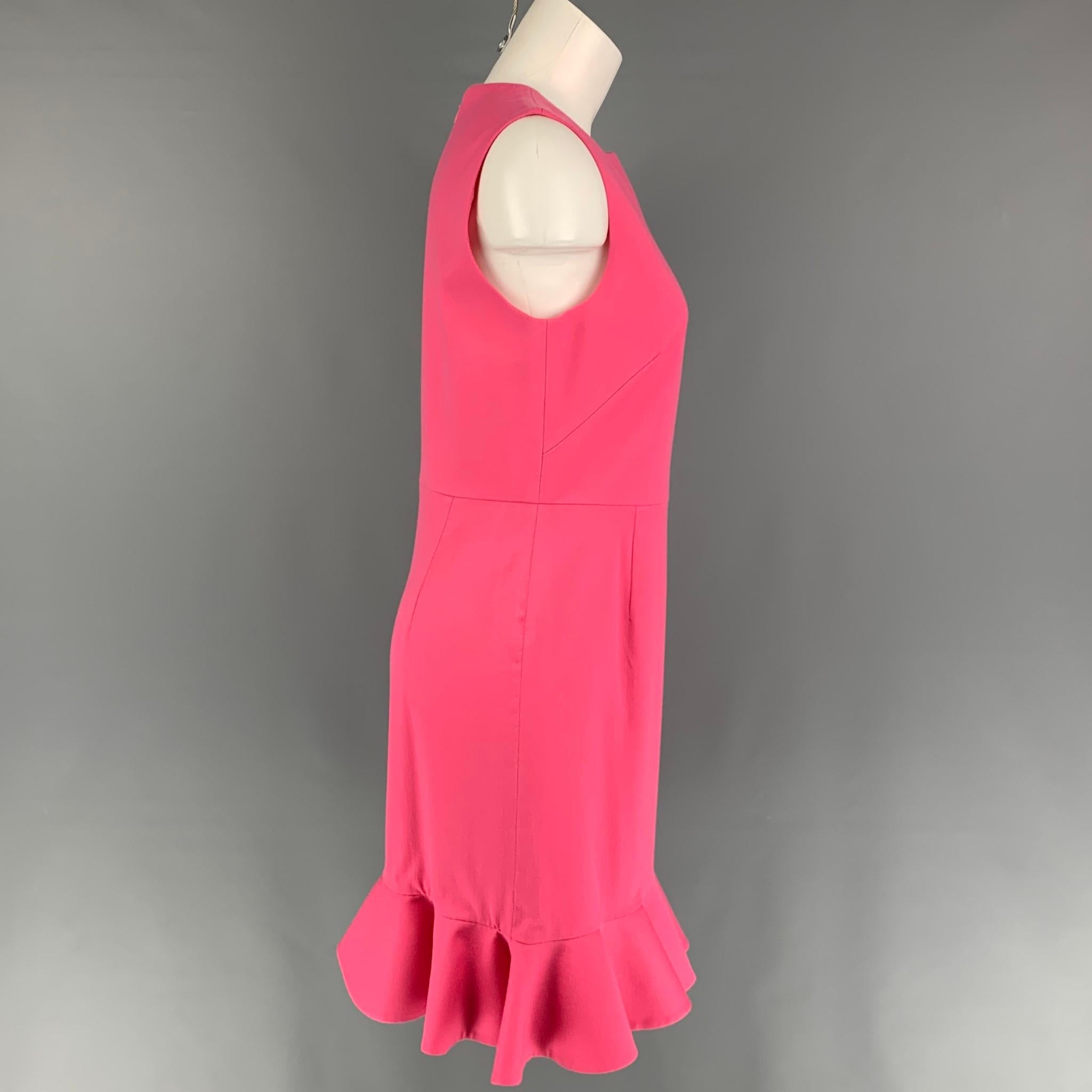 VALENTINO dress comes in a pink wool blend featuring a ruffled hem, sleeveless, and a back zip up closure. Made in Italy. 

Very Good Pre-Owned Condition.
Marked: 8

Measurements:

Shoulder: 13.5 in.
Bust: 34 in.
Waist: 30 in.
Hip: 36 in.
Length: