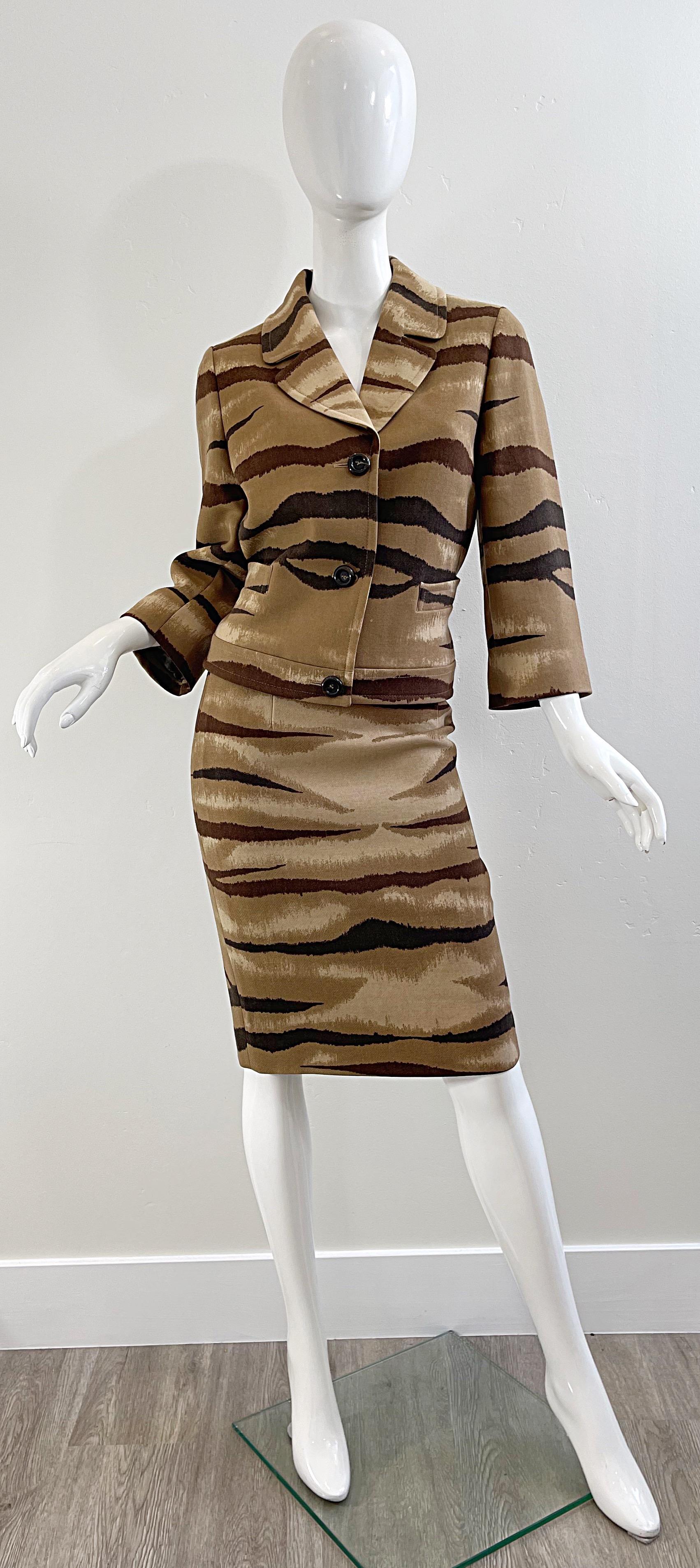 Stylish VALENTINO early 2000s Size 8 tiger / zebra animal print brown, tan and camel lightweight wool skirt suit ! Features a high waisted pencil skirt with hidden zipper up the back. Blazer jacket has a sleek tailored fit with belt strap in the