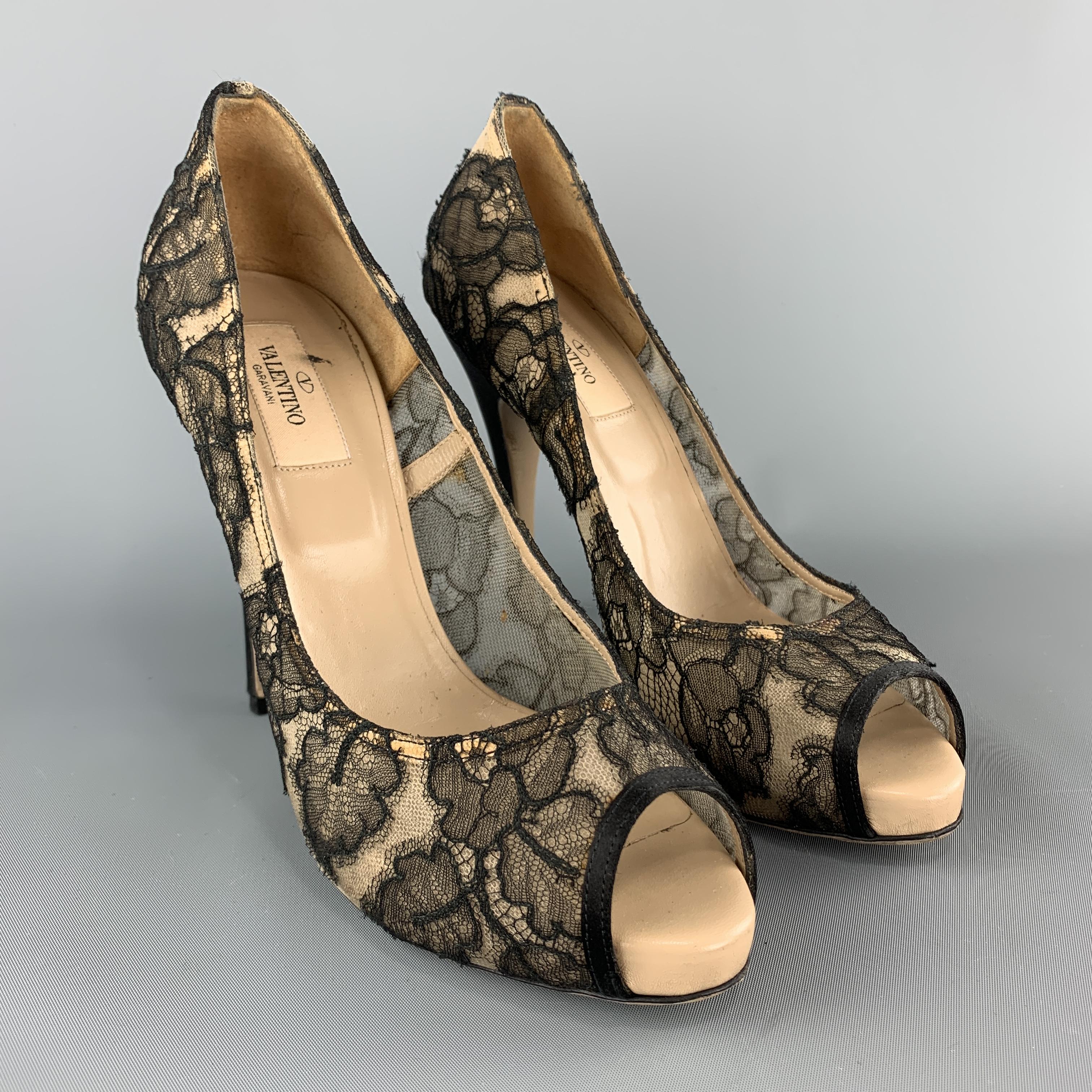 VALENTINO pumps come in black lace with beige tulle lining, beige leather insole, and black satin stiletto heel. Made in Italy.

Excellent Pre-Owned Condition.
Marked: IT 38.5

Heel: 4.75 in.
Platform: 0.75 in.