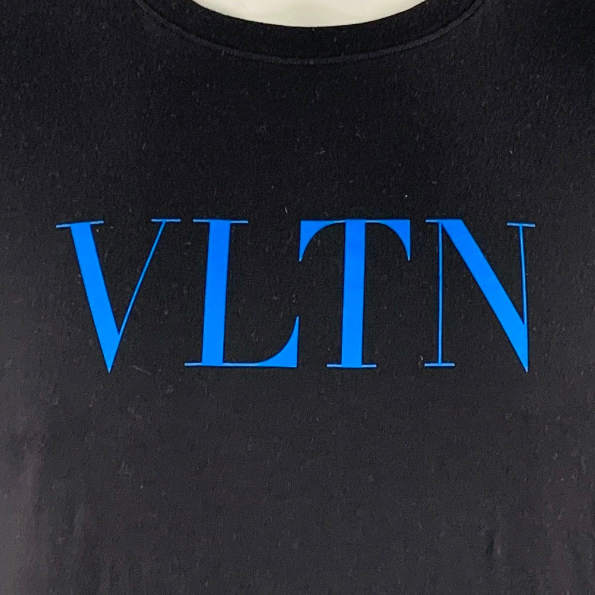 VALENTINO t-shirt in a black cotton jersey featuring blue VLTN logo, short sleeves, and crew neck. Made in Italy.Excellent Pre-Owned Condition. 

Marked:   L 

Measurements: 
 
Shoulder: 19 inches Chest: 44 inches Sleeve: 8 inches Length: 28 inches