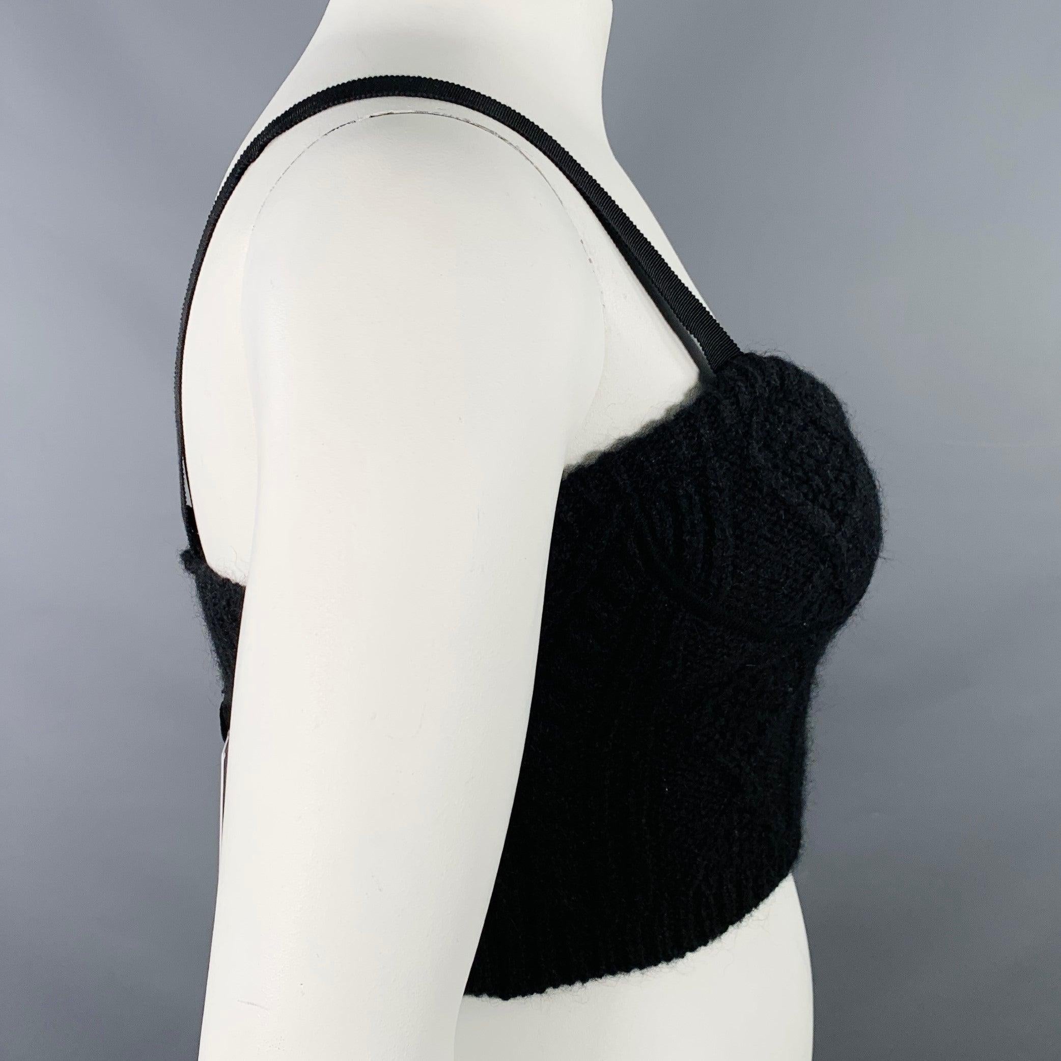 RED VALENTINO casual top
in a black mohair blend knit featuring a bustier style, cable knit design, and ribbon straps.New with Tags. 

Marked:   L 

Measurements: 
 
Shoulder: 12 inches Bust: 32 - 36 inches Length: 7 inches 
  
  
 
Sui Generis