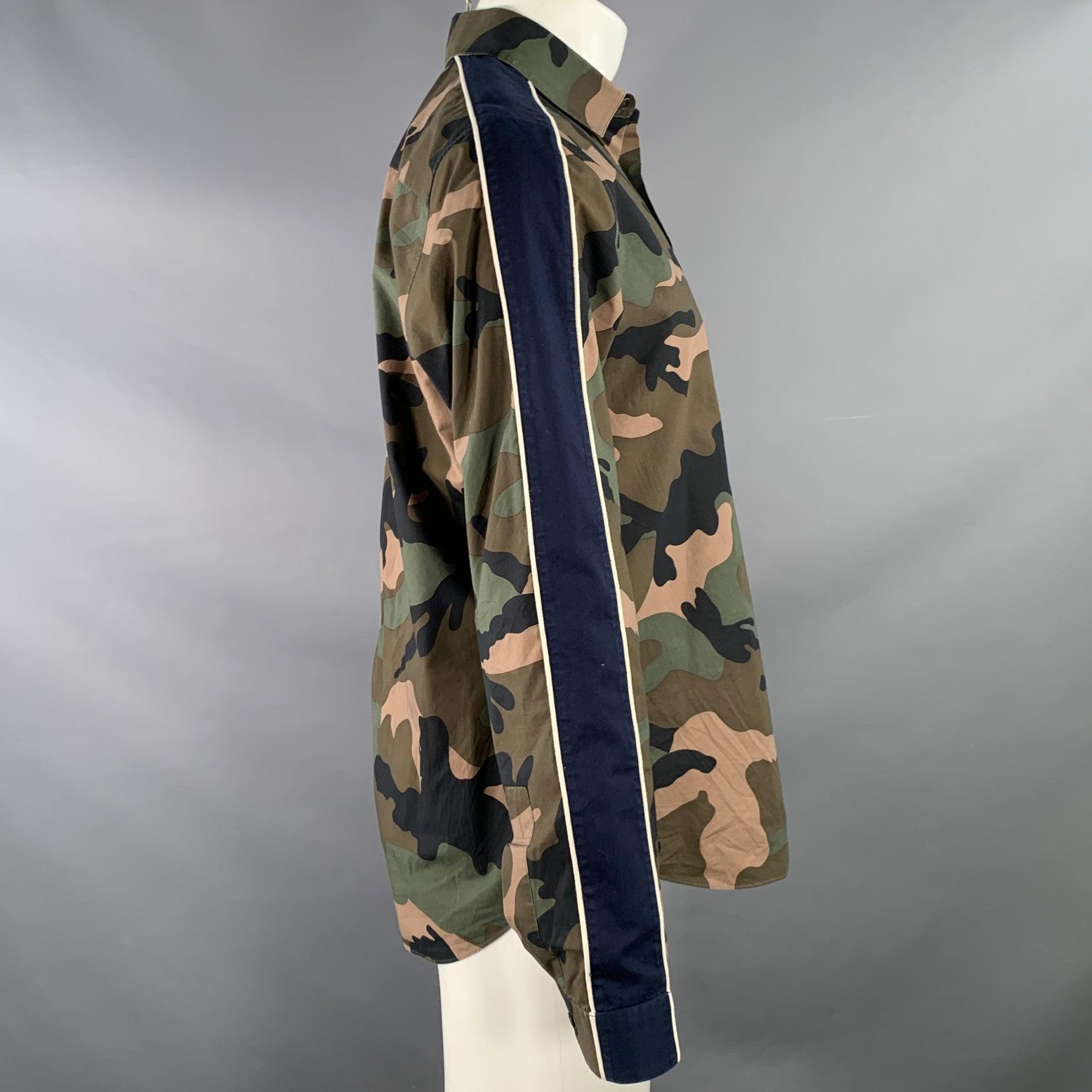 VALENTINO long sleeve shirt
in an olive green cotton featuring a camouflage pattern, blue side track stripes, one pocket, and button closure. Made in Italy.Excellent Pre-Owned Condition. 

Marked:   41/16 

Measurements: 
 
Shoulder: 16.5 inches