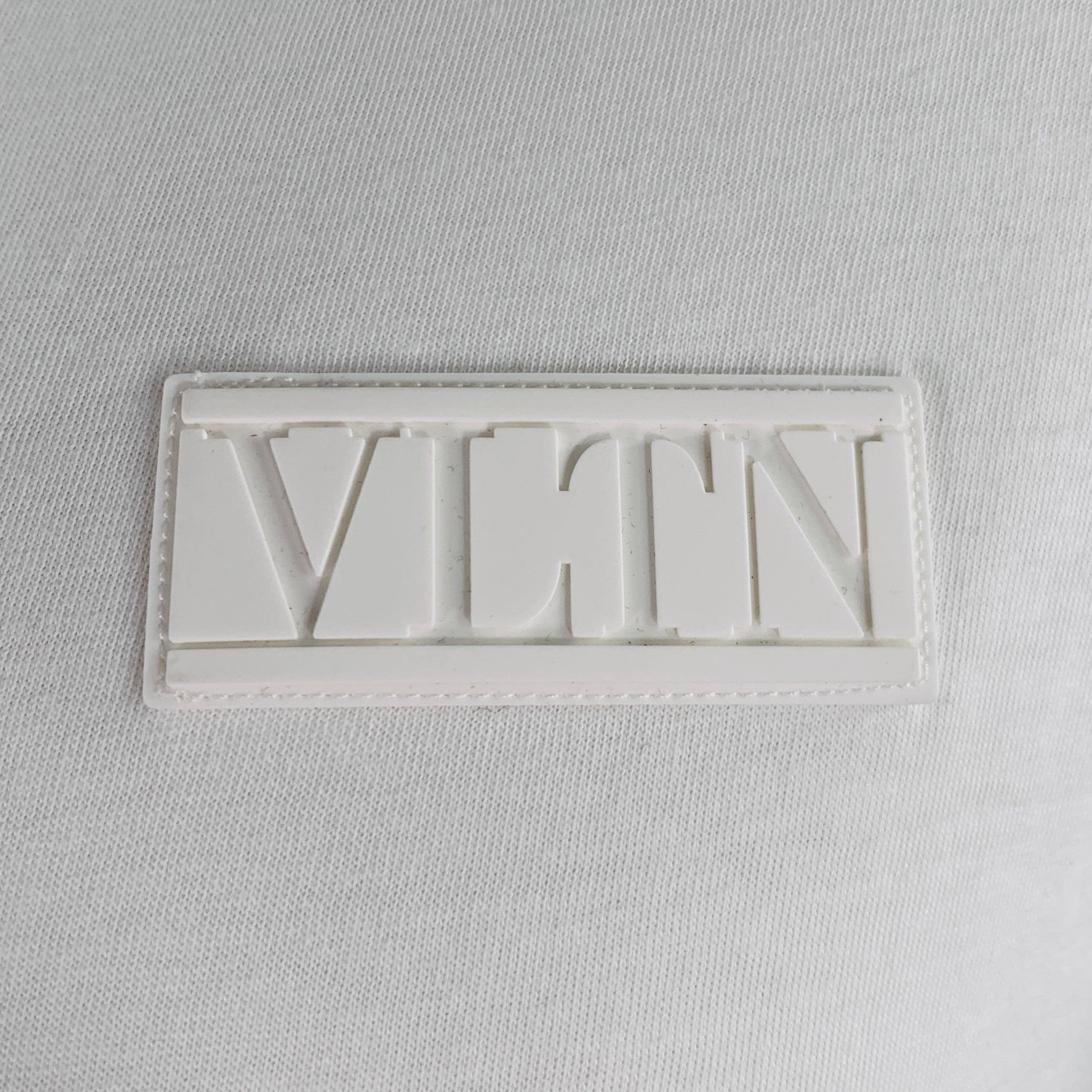 VALENTINO t-shirt
in a white cotton jersey featuring white rubber logo patch, short sleeves, and crew neck. Made in Italy.Very Good Pre-Owned Condition. Minor mark on collar. 

Marked:   XL 

Measurements: 
 
Shoulder: 20 inches Chest: 48 inches
