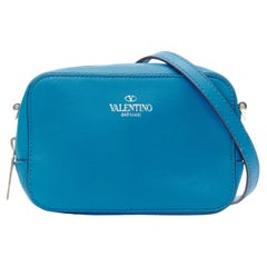 VALENTINO smooth blue leather logo stamp crossbody camera bag