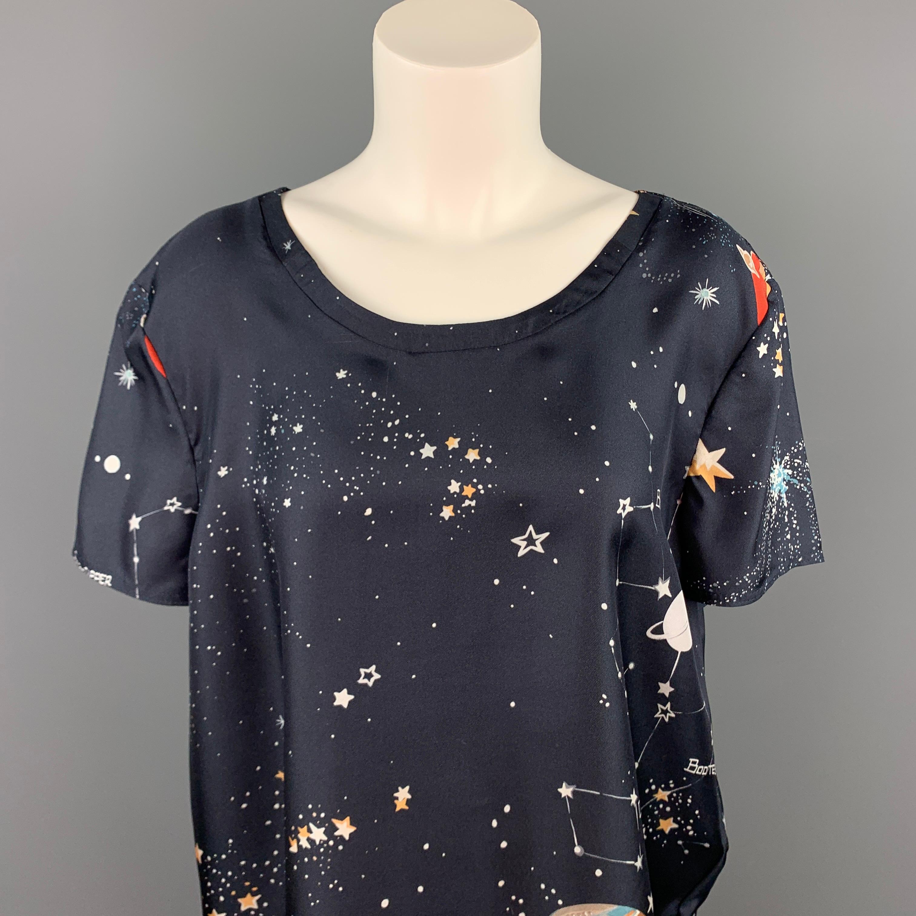 VALENTINO Spa blouse comes in a navy silk with a 