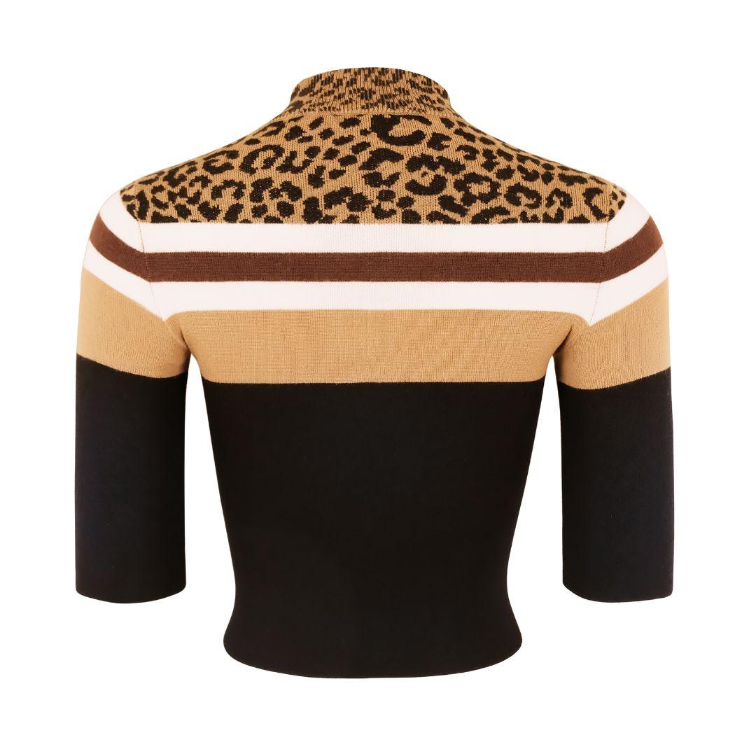Valentino sporty striped zip up short sleeve sweater top with logo embroidery detail.

Black, beige, white, brown and leopard print stripes.

Quarter zip collar can be worn open or all the way up for a mock neck look.

Tight fitting sleeves hit