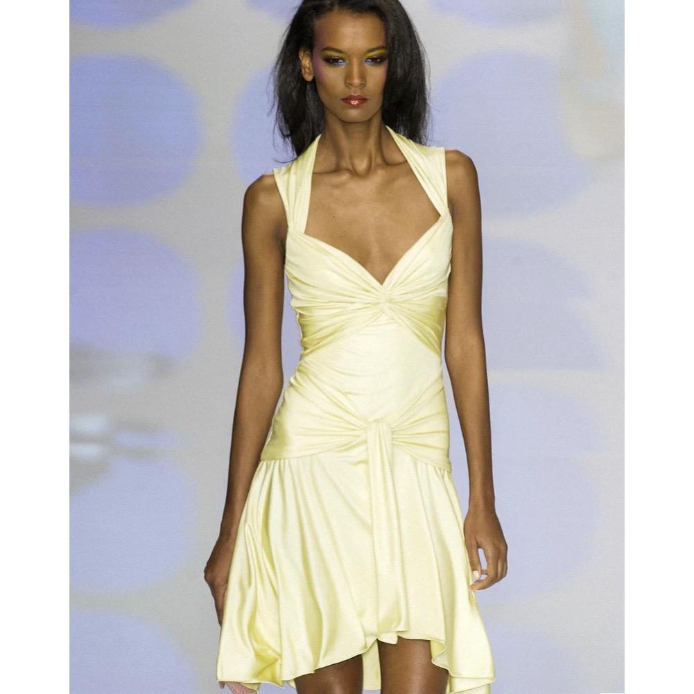 Super cute Valentino plunging rushed little black dress from Spring Summer 2004 as seen both on the runway and the campaign of that season in another color way, and on various editorials. This is the perfect little black summer dress as this garment