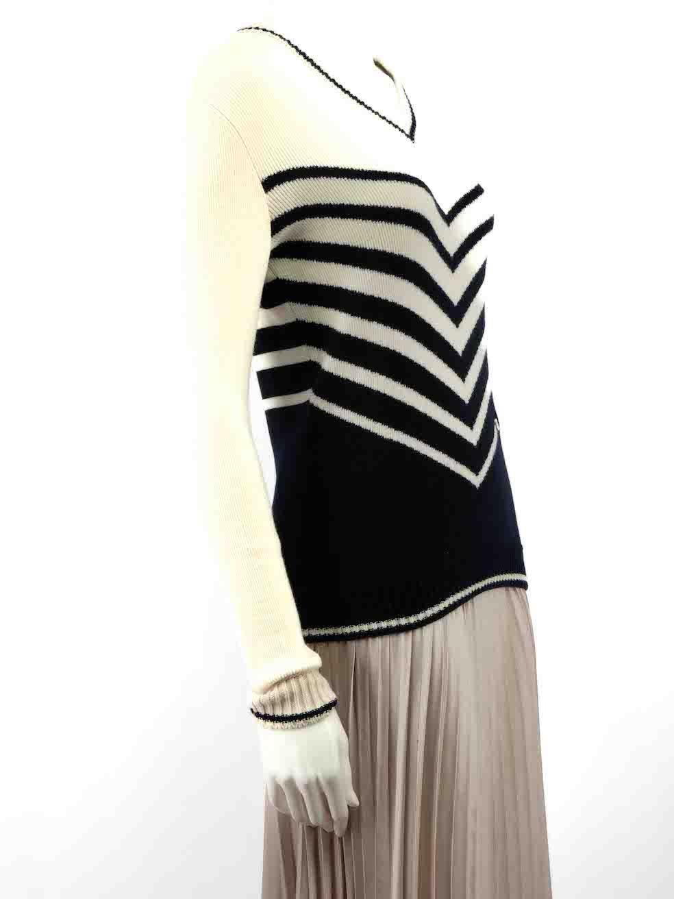 CONDITION is Very good. Hardly any visible wear to jumper is evident on this used Valentino designer resale item.
 
 Details
 Multicolour
 Wool
 Knit jumper
 V-neck
 Long sleeves
 Striped pattern
 
 
 Made in Italy
 
 Composition
 70% Wool, 30%