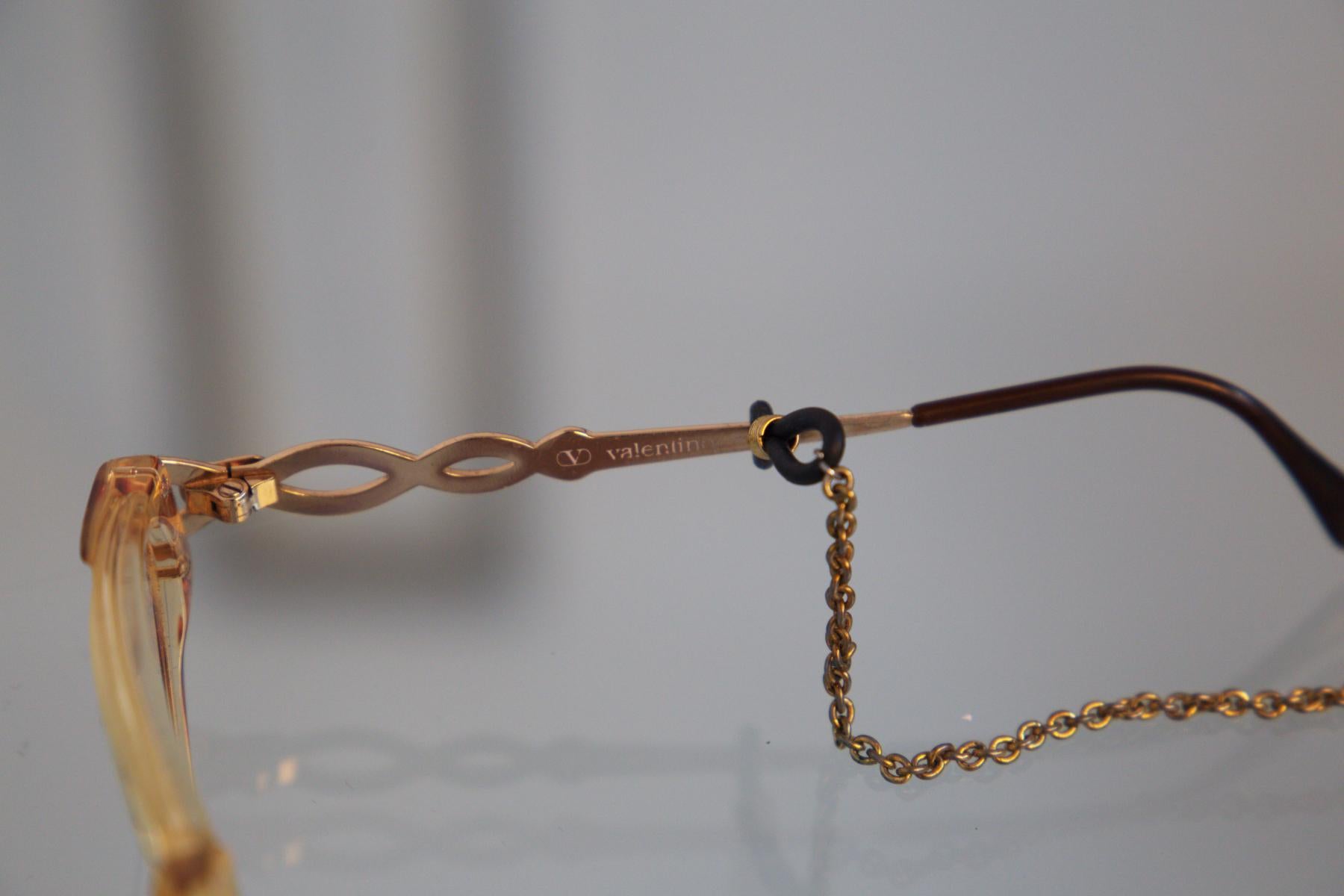 valentino glasses with chain