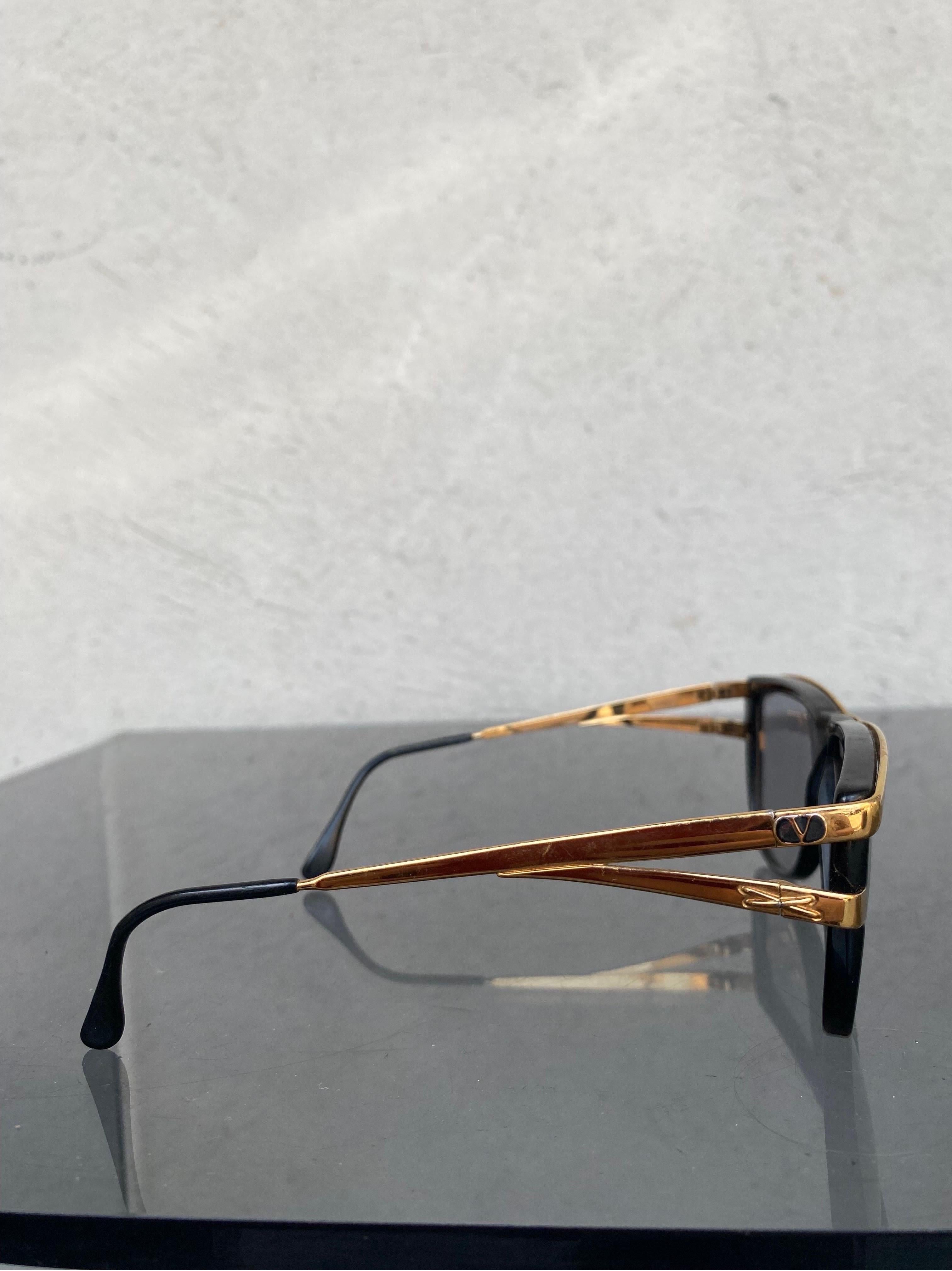 Vintage Valentino sunglasses
With golden metal parts. 
Width 14.5
Height 5
Temple length 13
The golden metal part has some scratches. 
In good vintage condition, shows signs of normal use.