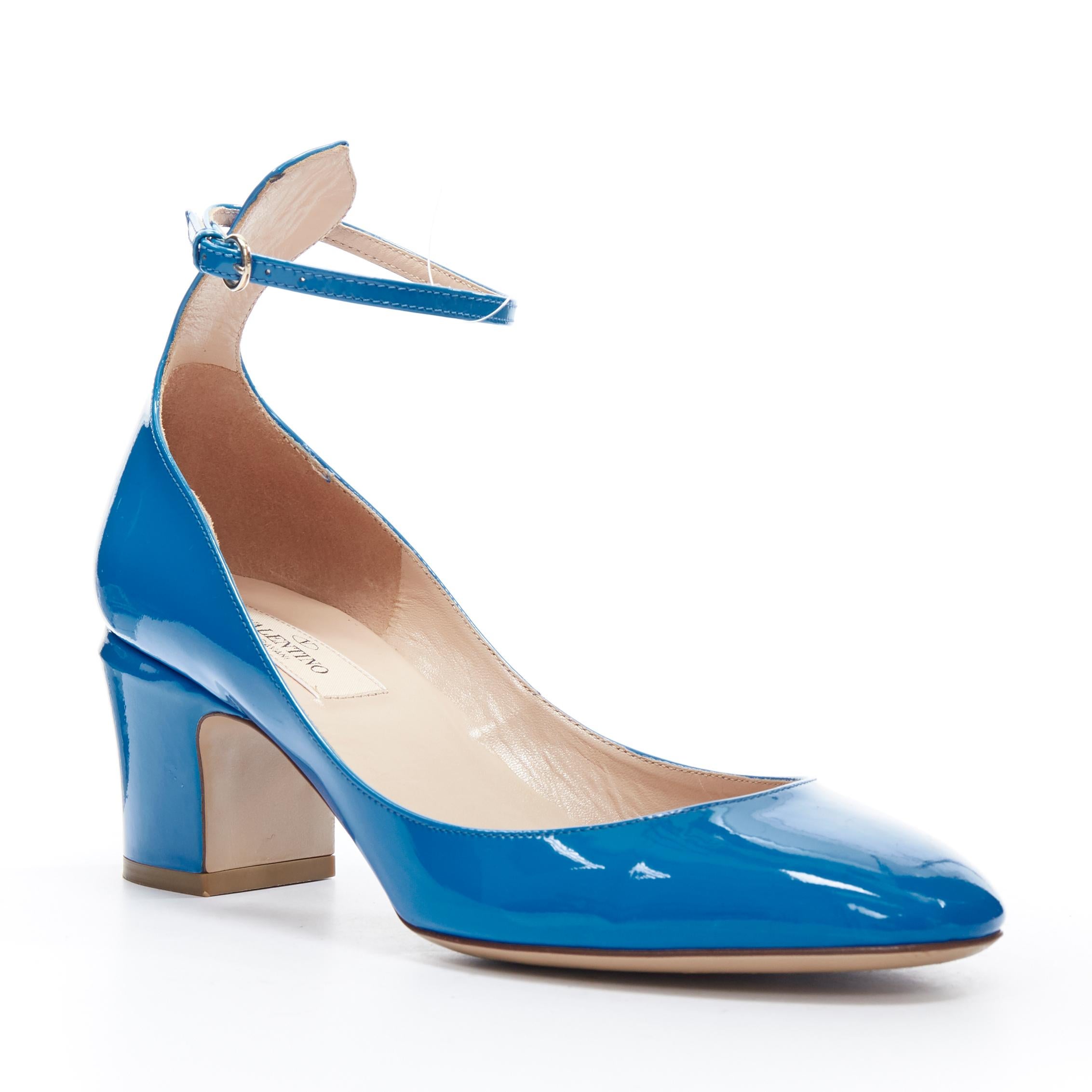 VALENTINO Tango blue patent leather round toe block heel ankle strap pump EU37.5 
Reference: LNKO/A01213 
Brand: Valentino 
Model: Tango 
Material: Patent leather 
Color: Blue 
Pattern: Solid 
Closure: Ankle Strap 
Extra Detail: Mid (22.9 in) heel