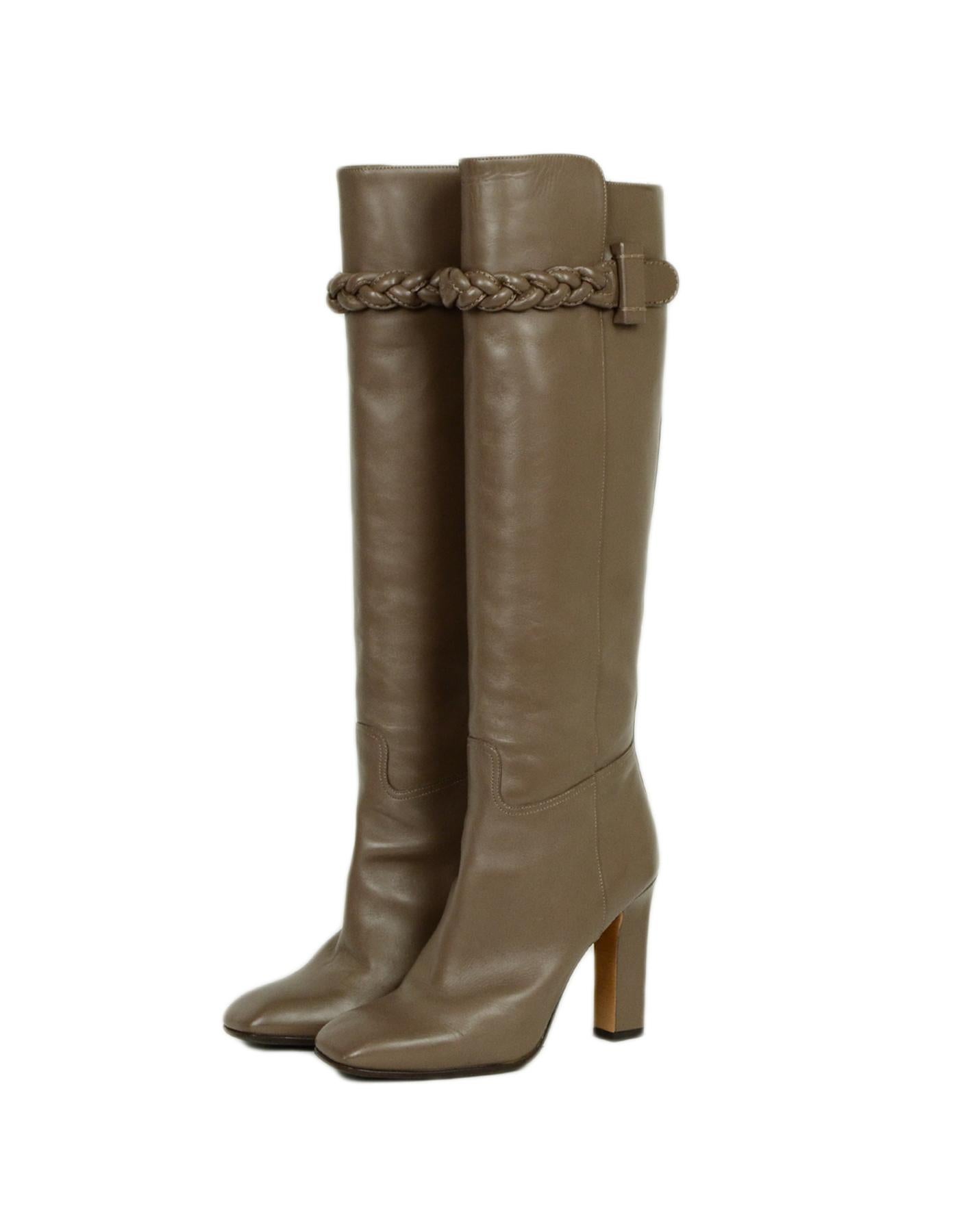 Valentino Taupe Leather Knee-High Boots w/ Braided Trim sz 37.5

Made In: Italy
Color: Taupe 
Materials: Leather
Closure/Opening: Slip-on 
Overall Condition: Excellent pre-owned condition, with the exception of some light scratches on the leather