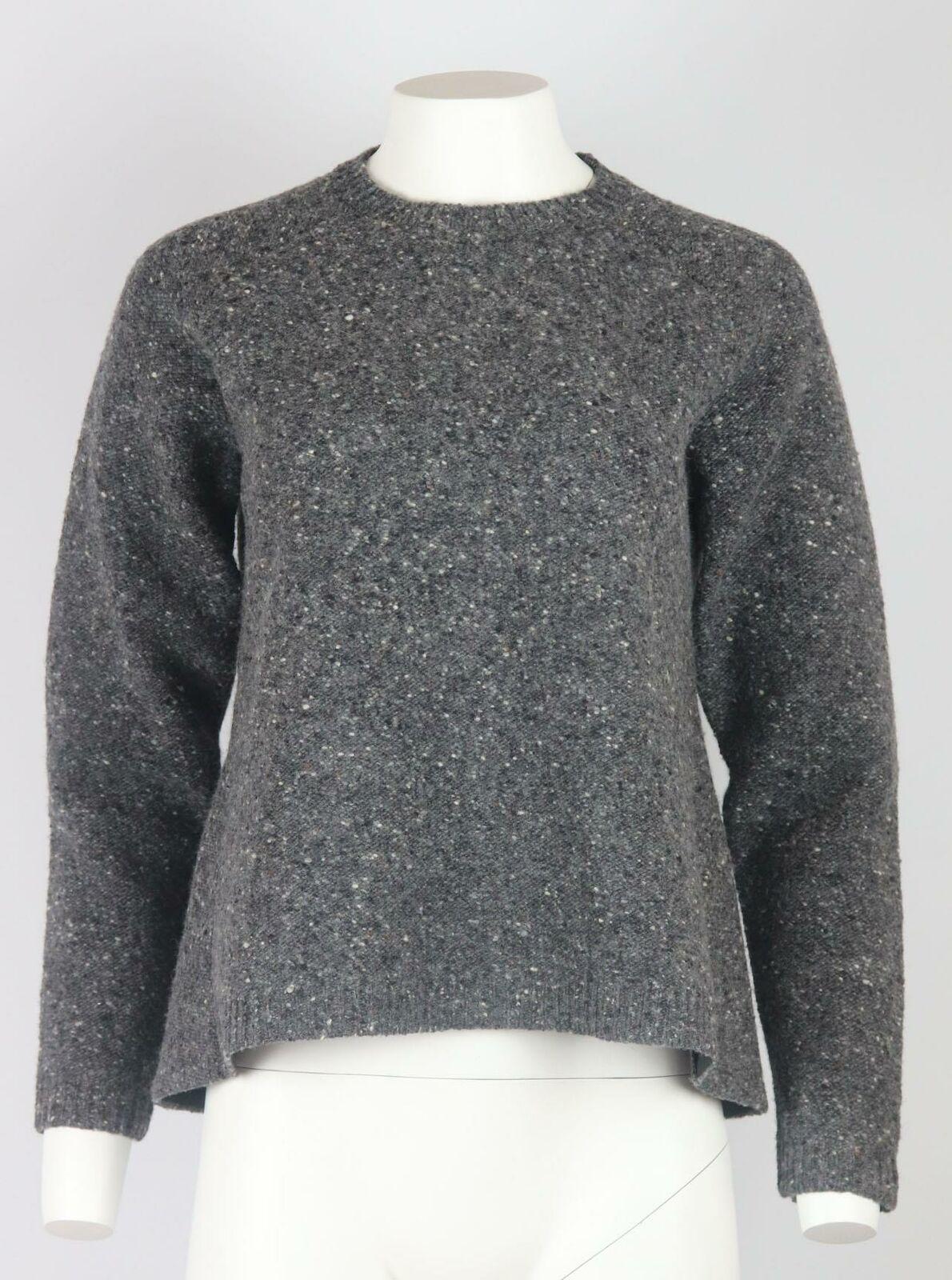 Valentino's sweater is designed in a classic crew-neck shape at the front and slight peplum silhouette at the back, it's been made in Italy from wool that's blended with tonal grey textured tones.
Grey wool.
Slips on.
100% Wool.

Size: Small (UK 8,