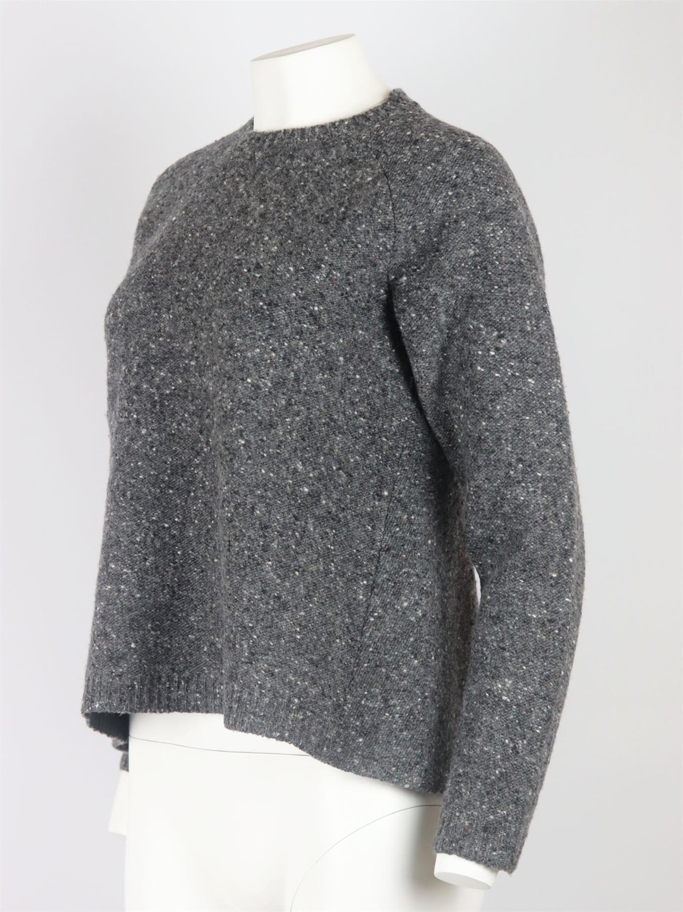 Valentino's sweater is designed in a classic crew-neck shape at the front and slight peplum silhouette at the back, it's been made in Italy from wool that's blended with tonal grey textured tones. Grey wool. Slips on. 100% Wool. Size: Small (UK 8,