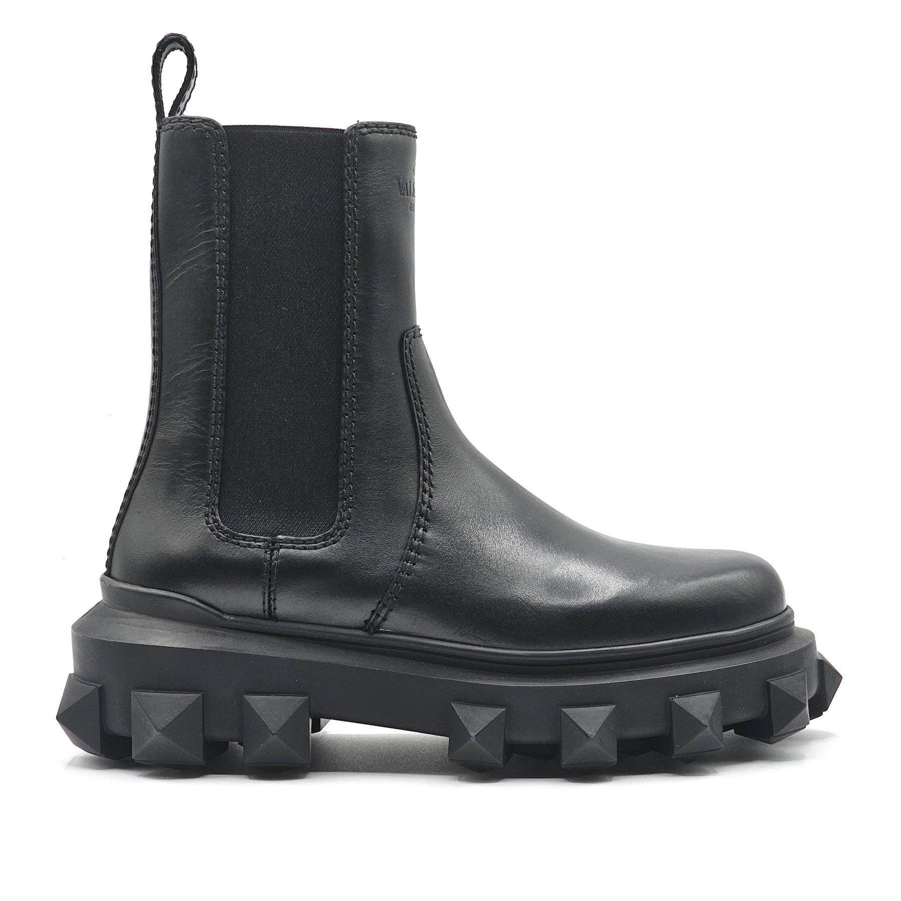 Valentino Trackstud Leather Boots.

Additional information:
Material: Leather, Rubber outsoles
Style: XW2S0EB6
Color: Black
Size: 7 US
Country: Italy
Condition: Brand new with box, The box is damaged.