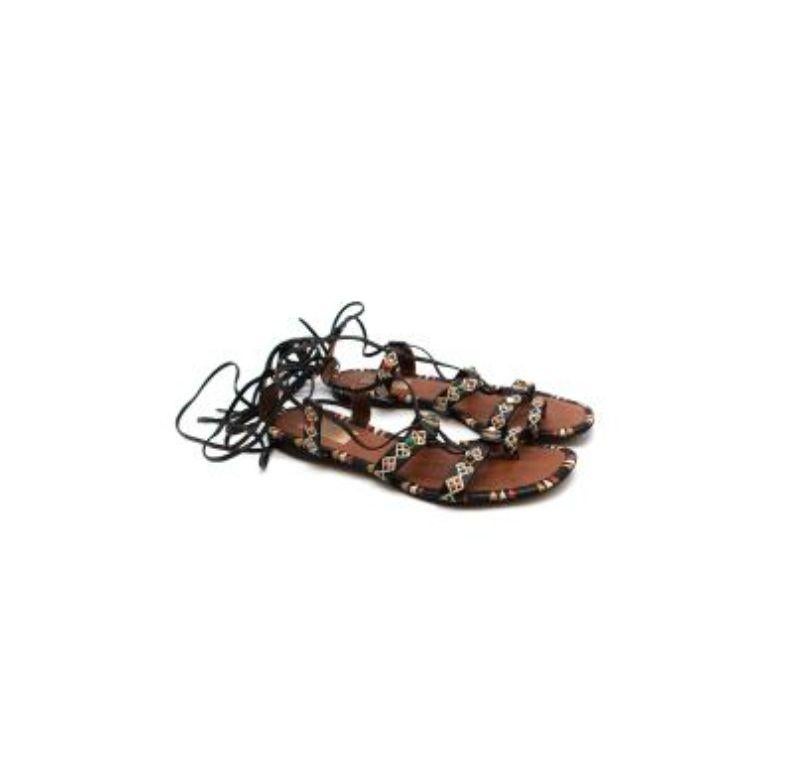 Valentino Multicolour Laced-ups Flats

- Soft black leather Valentino lace-up flats with red, white and yellow painted detailing
- Triangle features around the trim of the sole, as well as square coloured drawings on shoe straps and arch