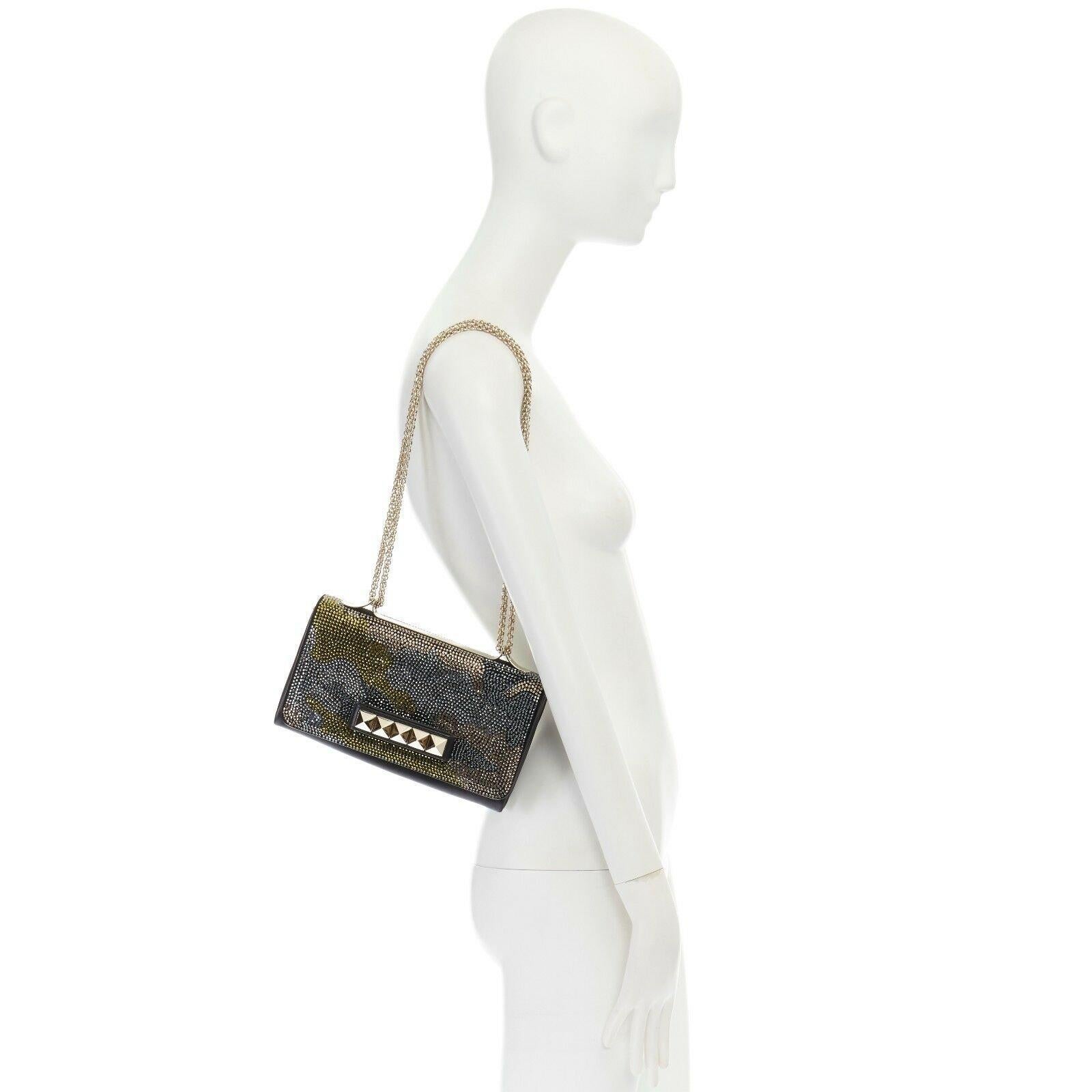 VALENTINO Va Va Voom crystal camouflage black Rockstud clutch shoulder bag Reference: LNKO/A00918 
Brand: Valentino 
Model: Va Va Voom 
Material: Crystal 
Color: Green 
Pattern: Camouflage 
Closure: Flap 
Extra Detail: Va Va Voom back. Black leather