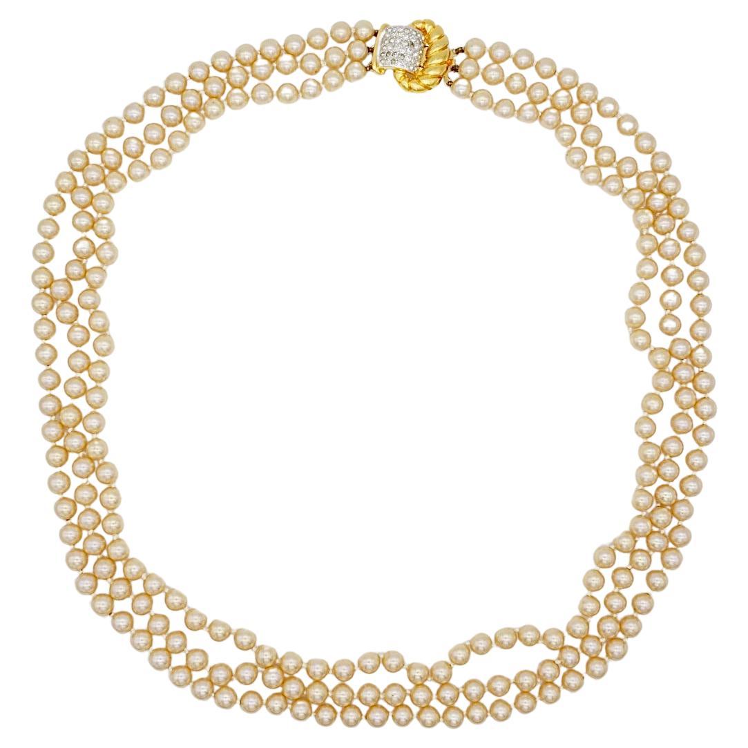 Valentino Garavani Vintage 1980s Golden Beads Pearls Trio Three 3 Strands Layers Crystals Pendant Long Necklace, Gold Plated

Very excellent condition. Maybe some light scratches, barely noticeable. All stones are attached, some of shine off.

Very