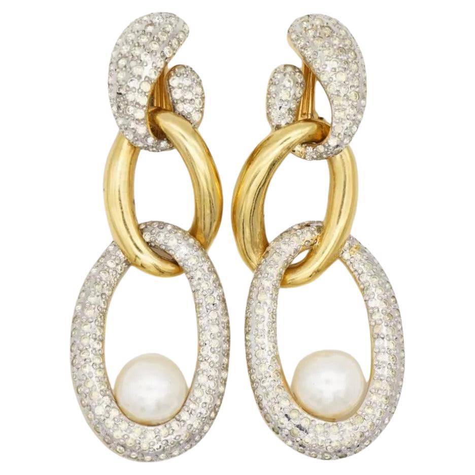 Valentino Garavani Vintage 1980s Vintage Extra Super Large Massive Long Trio 3 Oval Interlocked Hoop Crystals White Round Circle Pearl Chunky Statement Exquisite Glamorous Drop Dangle Clip Earrings, Gold Tone

Very good condition. Lights scratches