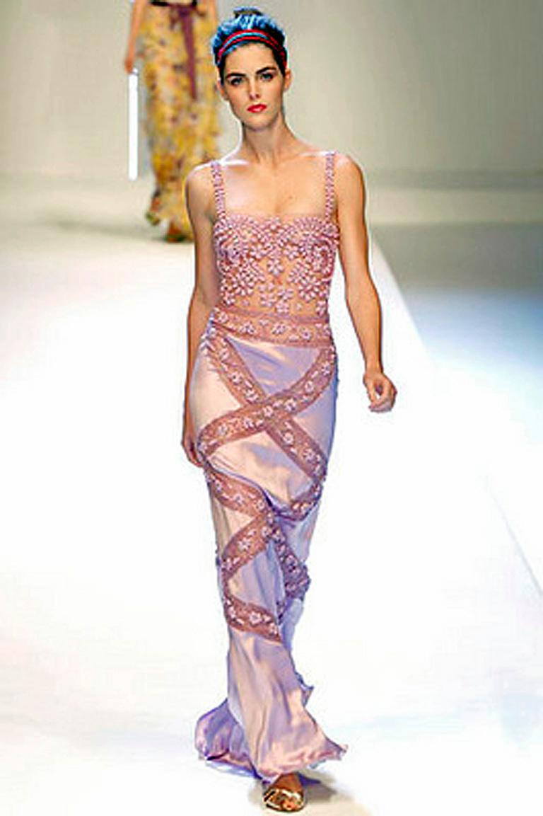valentino runway dress She's here.a Valentino Couture S/S 1997 masterpiece. A gown studded with beaded waterfalls falling effortlessly on silk, not to mention the stunning cape with a flower appliqu. This is the actual runway