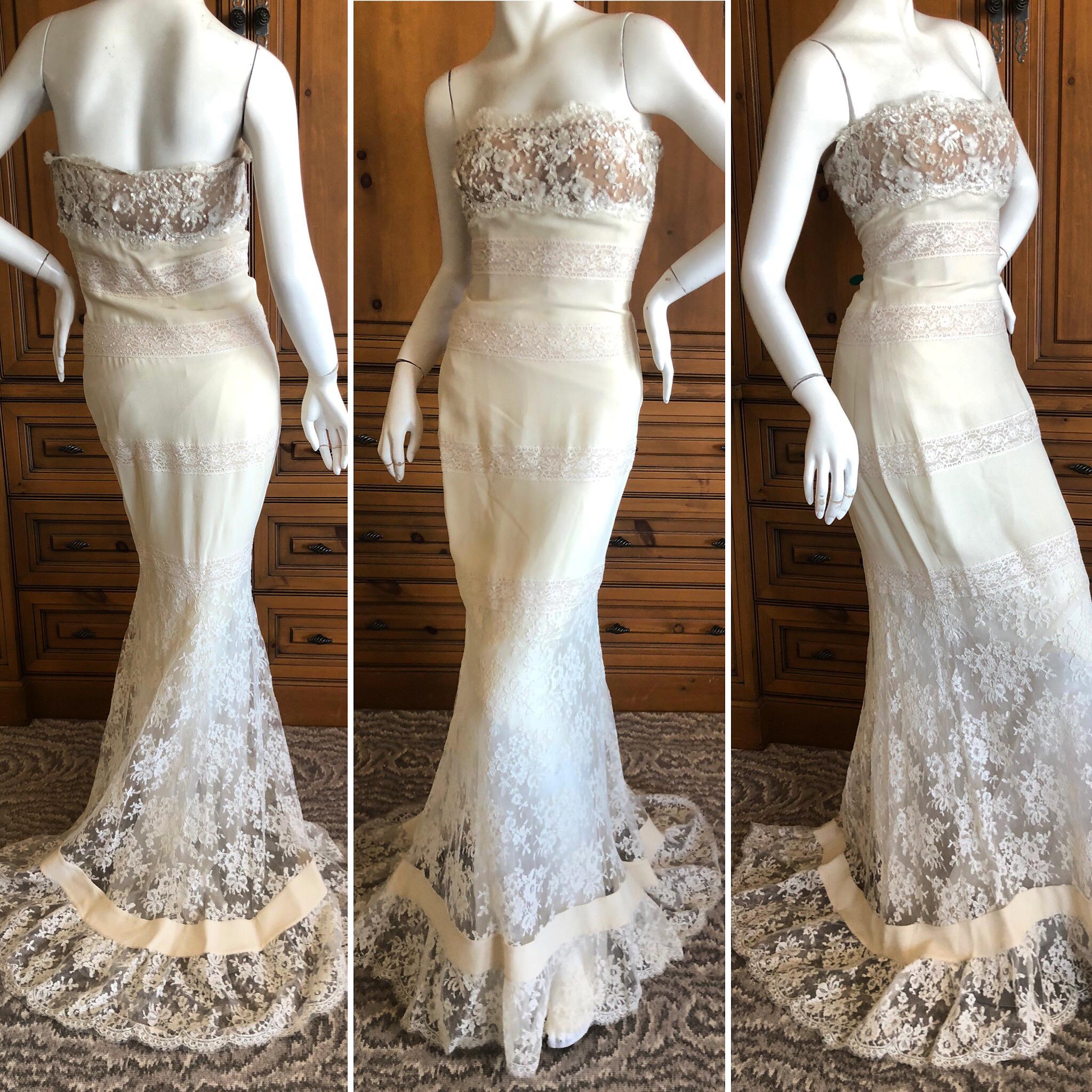 Valentino Vintage Lace Wedding or Evening Dress with Train.
So pretty . Much prettier in person, this was hard to capture in a photo.
There is an inner corset.
Size 6 
Bust  34