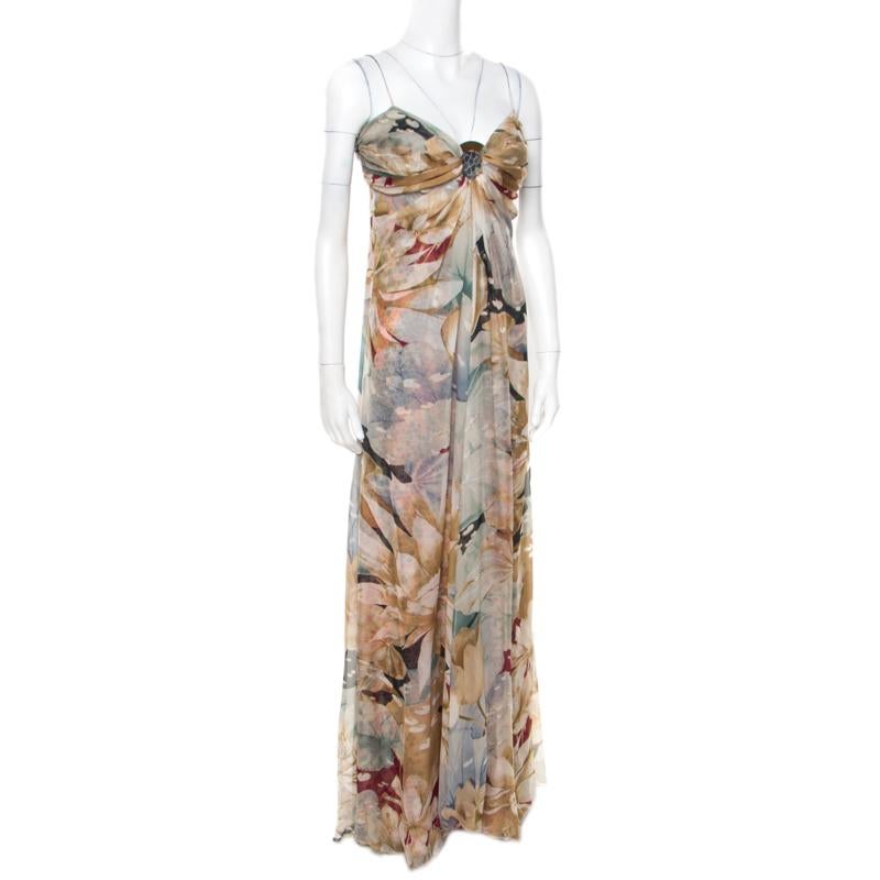 If elegance were a dress, it would be this one. The chiffon gown from Valentino is magnificent in appeal and design. It is beautifully covered in prints of florals and hexagons, has a gathered bodice and a flowy hem that falls to the floor.

