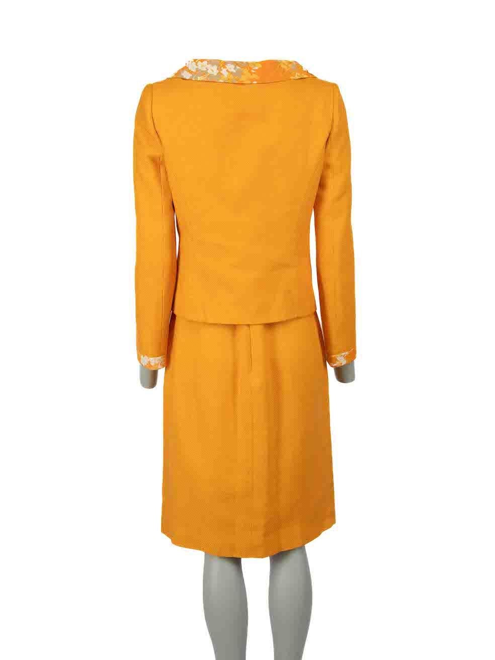 CONDITION is Very good. Minimal wear to set is evident. Minimal wear to lining of dress where stain marks and pull to weave on internal hemline is evident on this used Valentino designer resale item.

Details

Vintage
Orange
Cotton
Jacket and dress