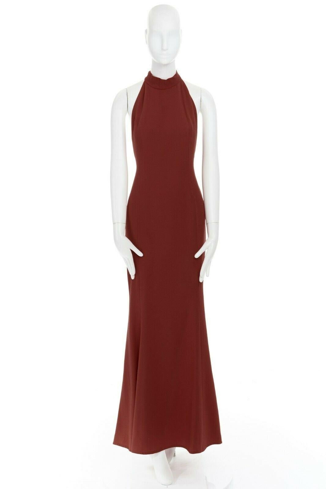 VALENTINO Vintage red crepe high halter neck racer back tie evening gown US6 M 
Reference: LACG/A00316 
Brand: Valentino 
Material: Acetate 
Color: Red 
Pattern: Solid 
Extra Detail: Acetate, wool, viscose. Scarlet red. High halter neck. Decorative