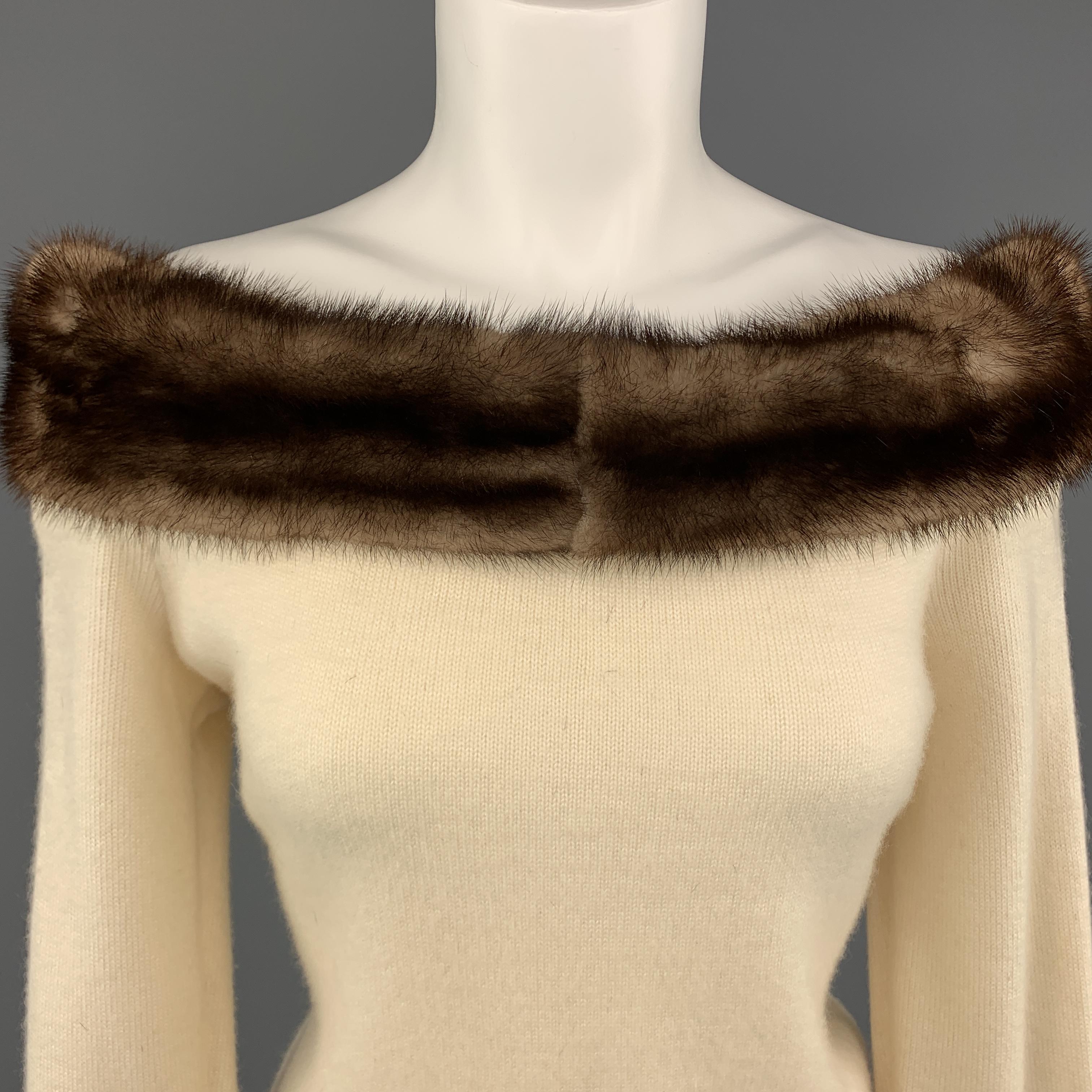 Vintage VALENTINO pullover sweater comes in cream cashmere knit with an off the shoulder, mink fur trimmed neckline. Made in Italy.
 
Very Good Pre-Owned Condition.
Marked: M
 
Measurements:
 
Shoulder: 19 in.
Bust: 40 in.
Sleeve: 25 in.
Length: 20