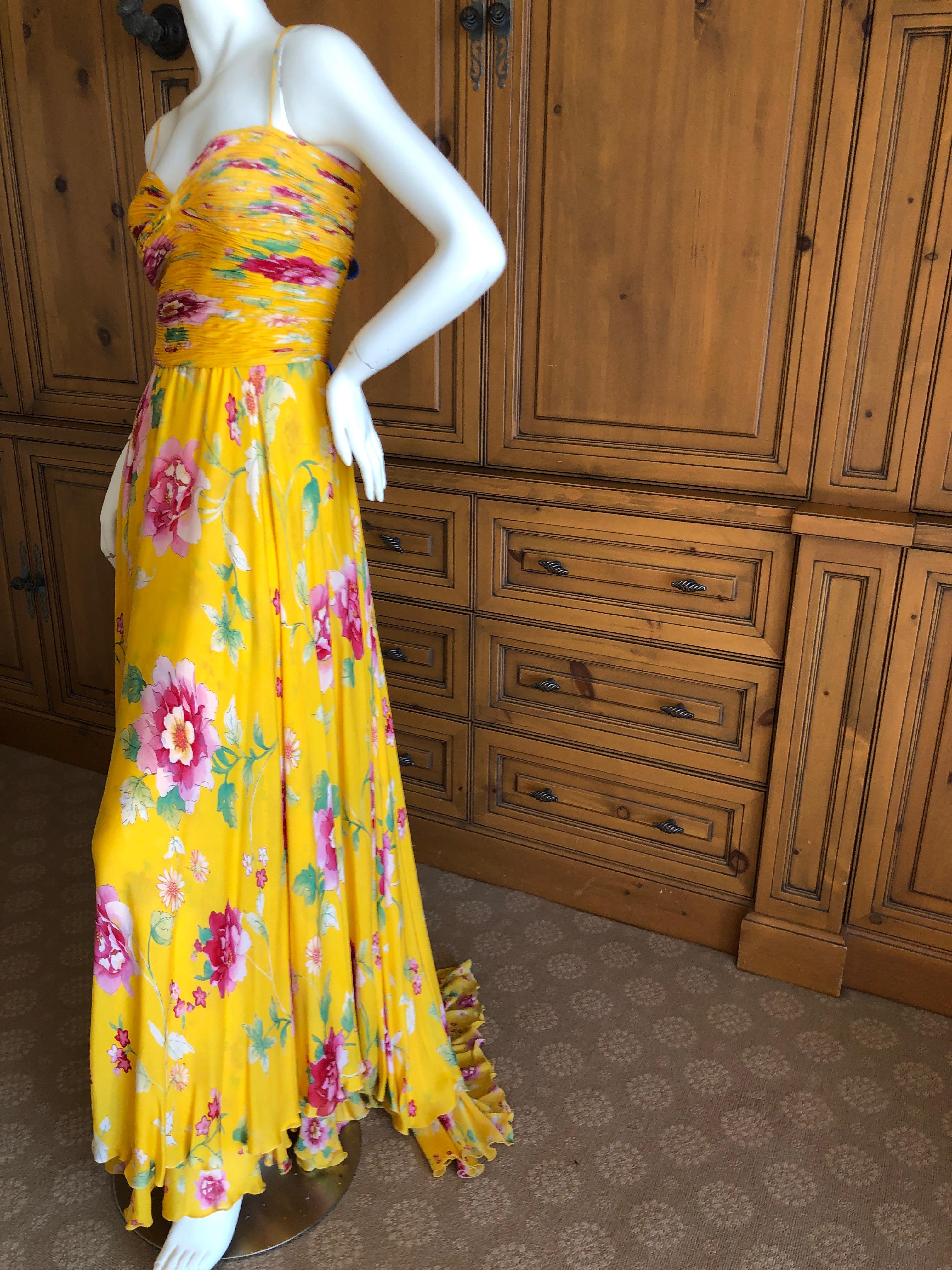 Valentino Vintage Yellow Silk Floral Evening Gown with Train.
So pretty , with a ruched bodice , and layers of flowing silk with a slight train.
Size 6
Bust  34
