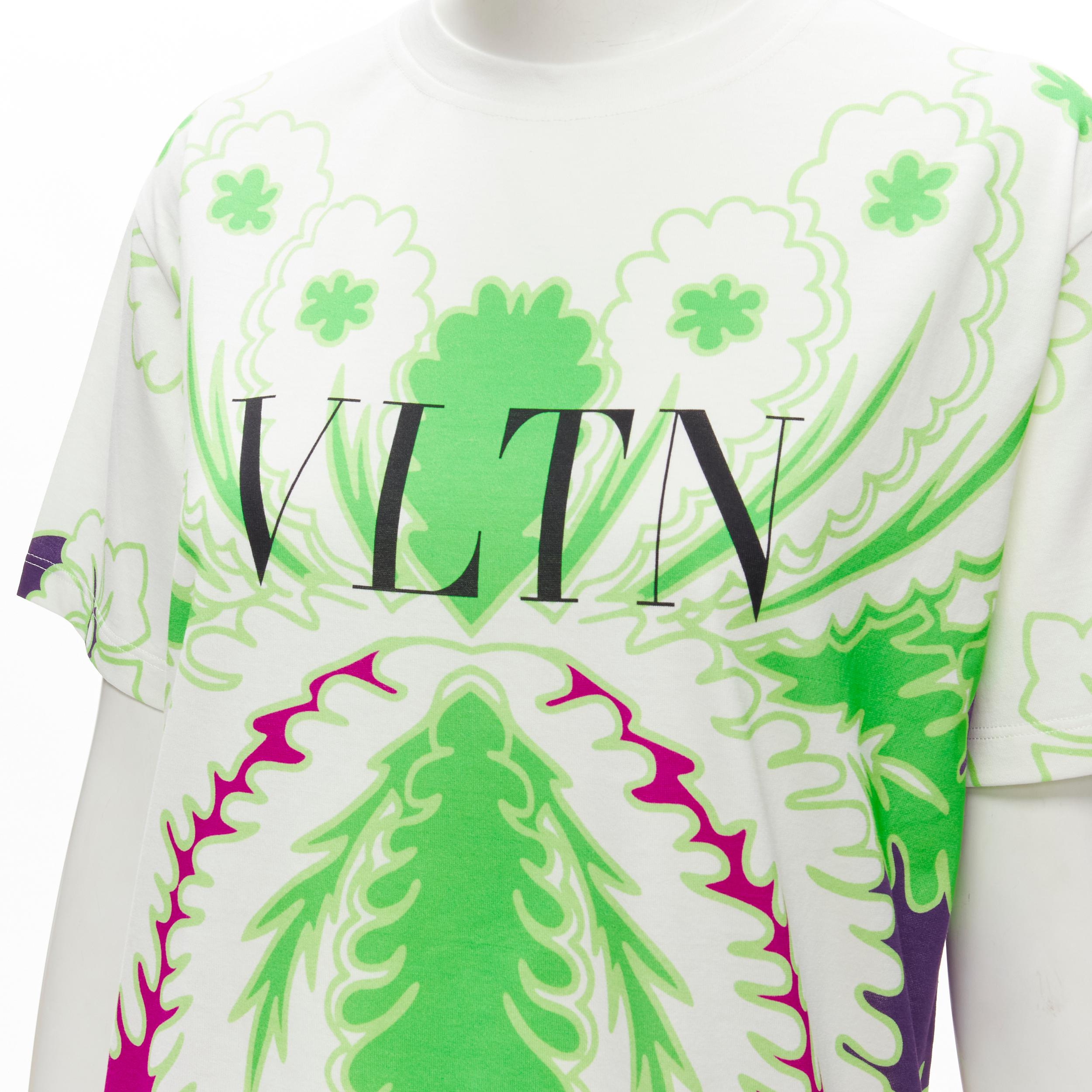 VALENTINO VLTN white neon green purple floral print cotton tshirt XS
Brand: Valentino
Material: Feels like cotton
Color: White
Pattern: Floral
Made in: Italy

CONDITION:
Condition: Excellent, this item was pre-owned and is in excellent condition.