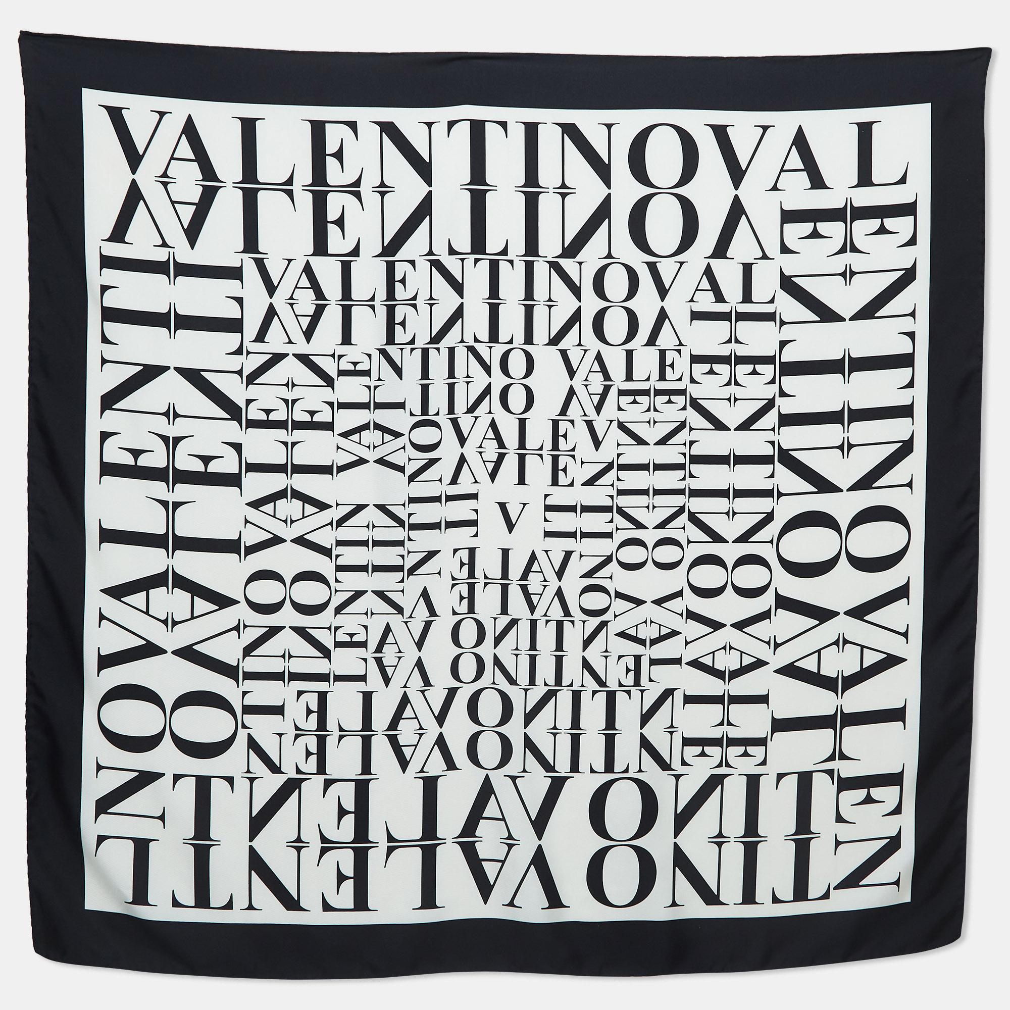 The Valentino Sscarf exudes timeless elegance with its luxurious silk fabric adorned with the iconic Valentino signature motif. Featuring a harmonious blend of sophistication and style, this accessory effortlessly elevates any ensemble with its