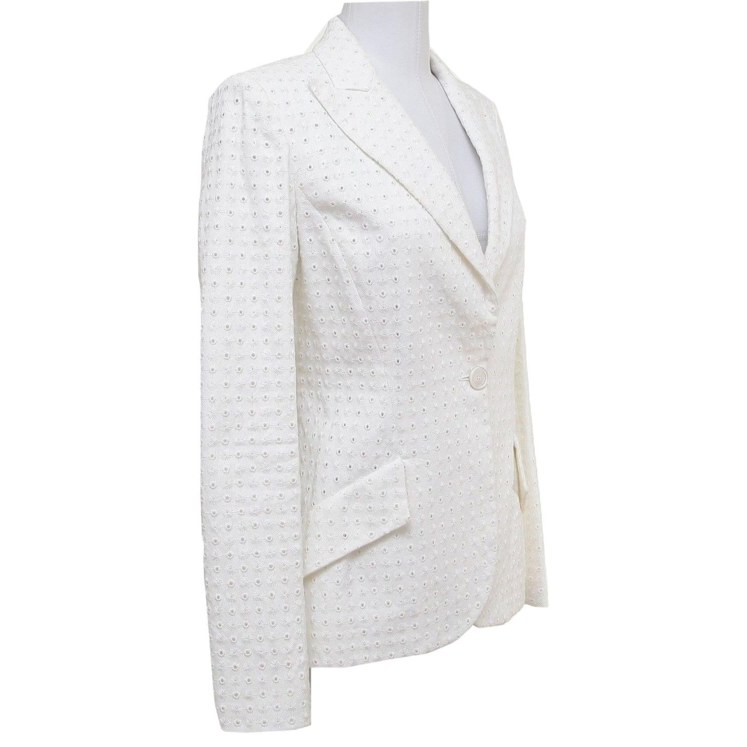 GUARANTEED AUTHENTIC VALENTINO TIMELESS WHITE JACKET

• Size: 4
• Material: 66% Cotton, 34% Viscose
• Design:
  - Sensational white 1 button single breast eyelet jacket.
  - Timeless size lapel and 2 front flap pockets at hip.
  - Lightly padded