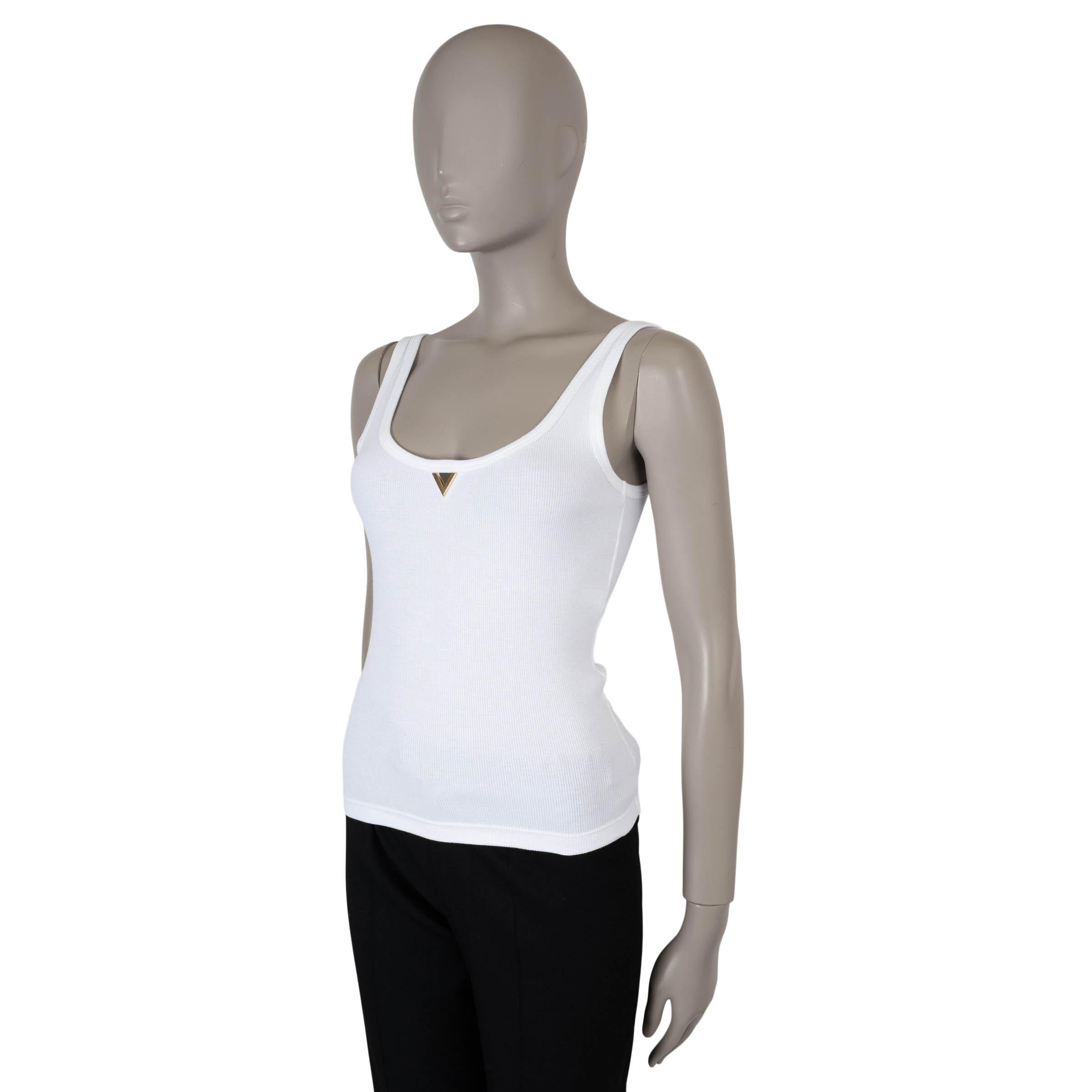 This 100% authentic Valentino tank top in white rib-knit jersey cotton (with 3% elastane - please note the content and size tag are missing) blends modern elegance with everyday wearability. Featuring a scoop neck and back, it is highlighted by a