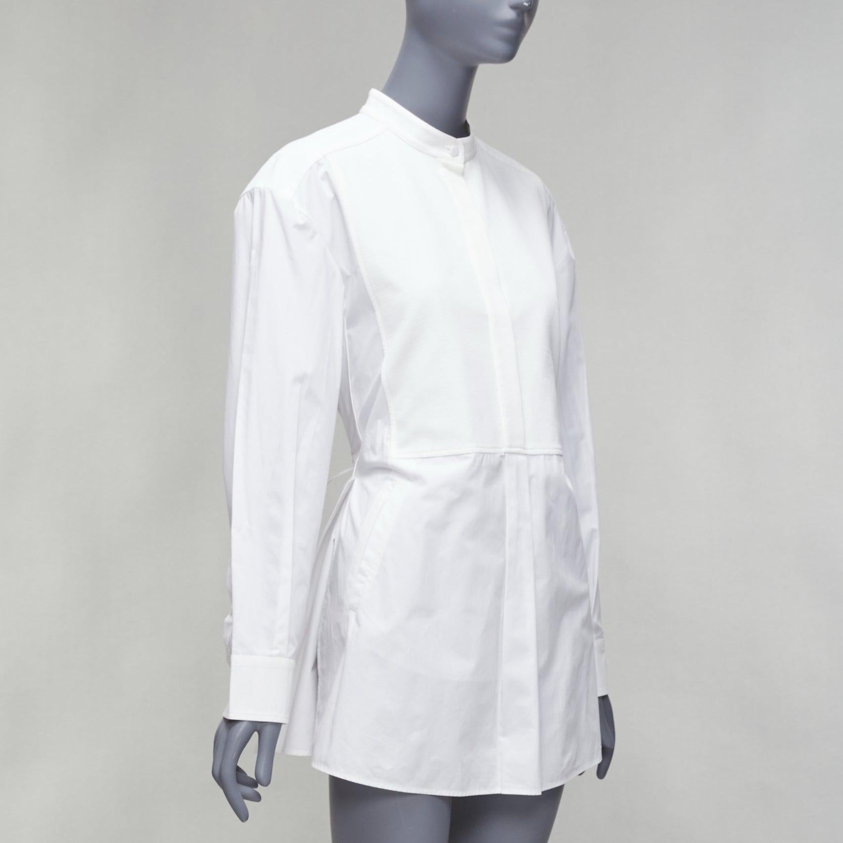 VALENTINO white cream cotton waffle front tie pleated back tux shirt IT36 XXS
Reference: LNKO/A02341
Brand: Valentino
Designer: Pier Paolo Piccioli
Material: Cotton
Color: White, Cream
Pattern: Solid
Closure: Self Tie
Extra Details: Tie bow at back.