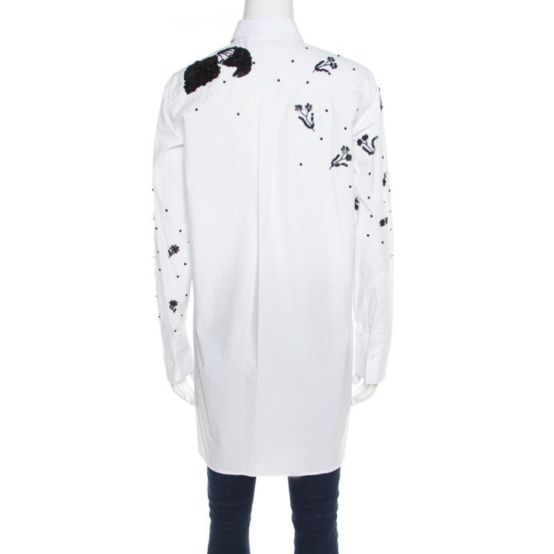 Known for its flair of combining fashion with art, Valentino has introduced another piece marking its prowess. This long-sleeved shirt in a perfect shade of white is a show stealer. Tailored with cotton, this elegant creation is embellished with