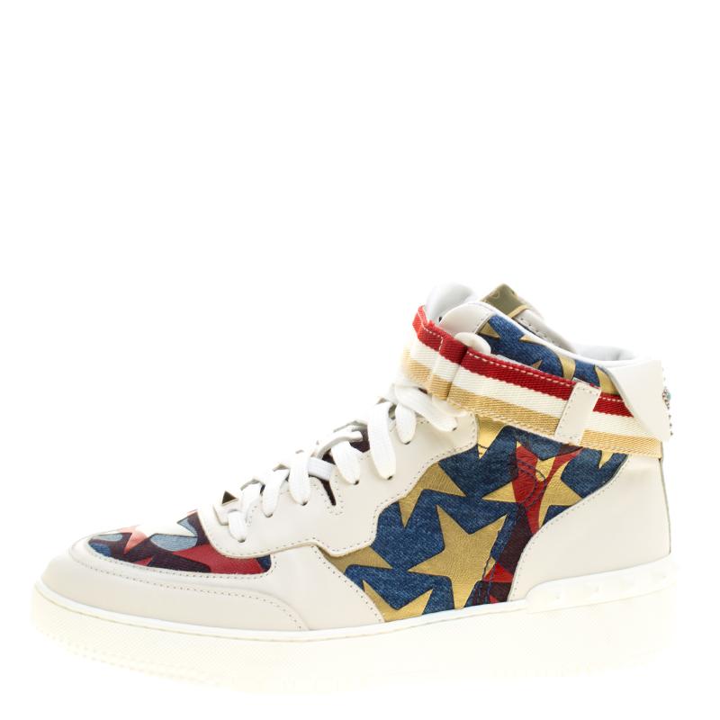 If you love to experiment with your style and add some unique pieces to your collection, this pair of valentine high top sneakers will create a statement with your casual and casual chic looks. Crafted in white leather with camouflage star patterned