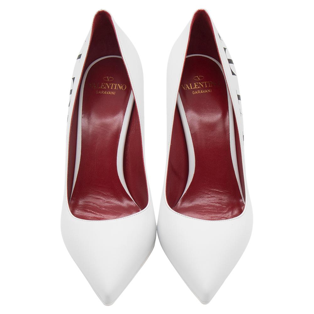 Effortlessly slip into this amazing pair of pumps from the house of Valentino. They are crafted from leather featuring pointed toes, high heel, and the VLTN logo near the counters. The understated design of these classic white pumps will lend a