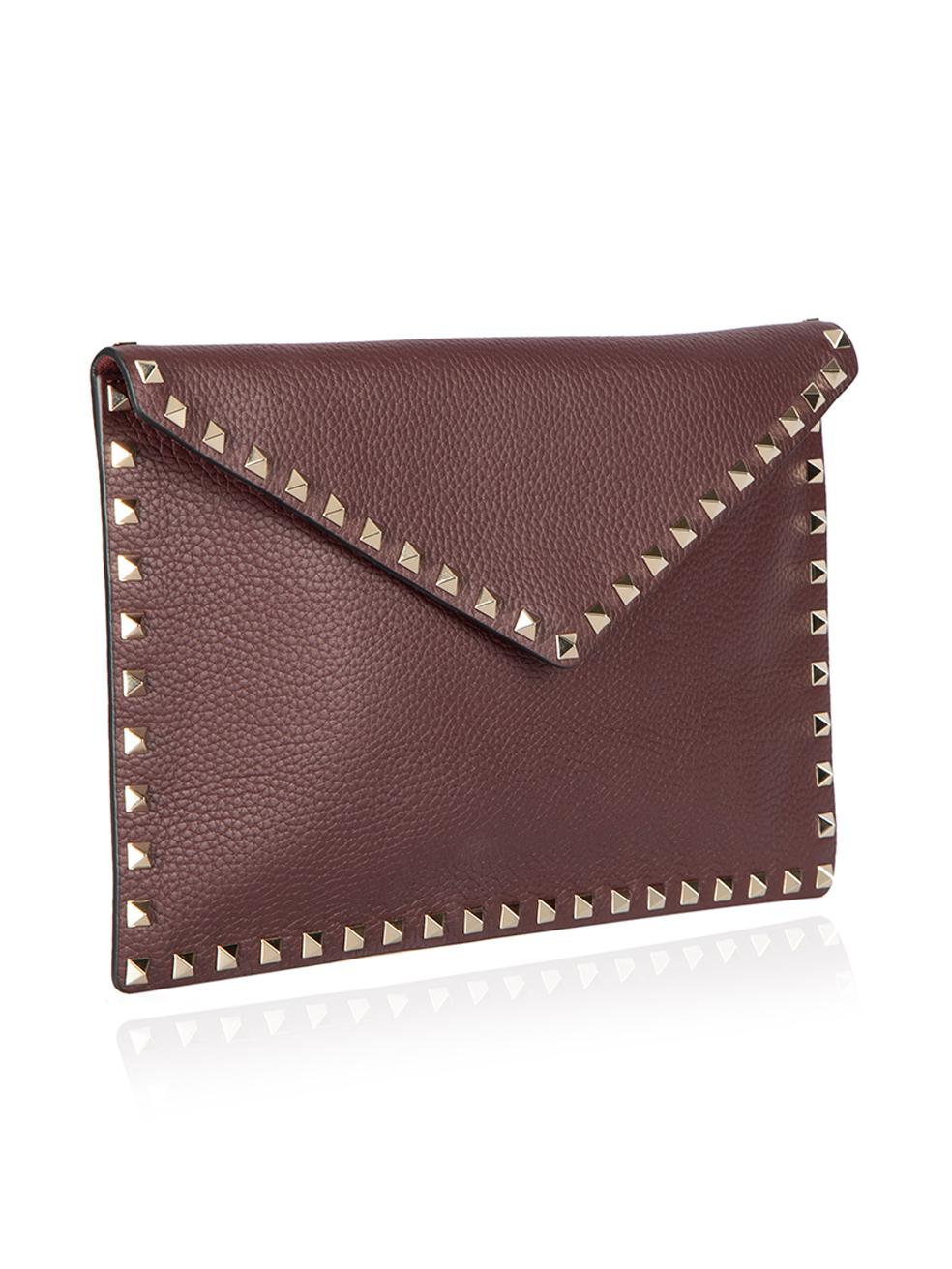 CONDITION is Never Worn. No visible wear to clutch is evident on this used Valentino designer resale item. This bag comes with original dust bag.



Details


Burgundy 

Leather

Medium envelope clutch bag

Silver stud detail

Magnetic fastening

1x