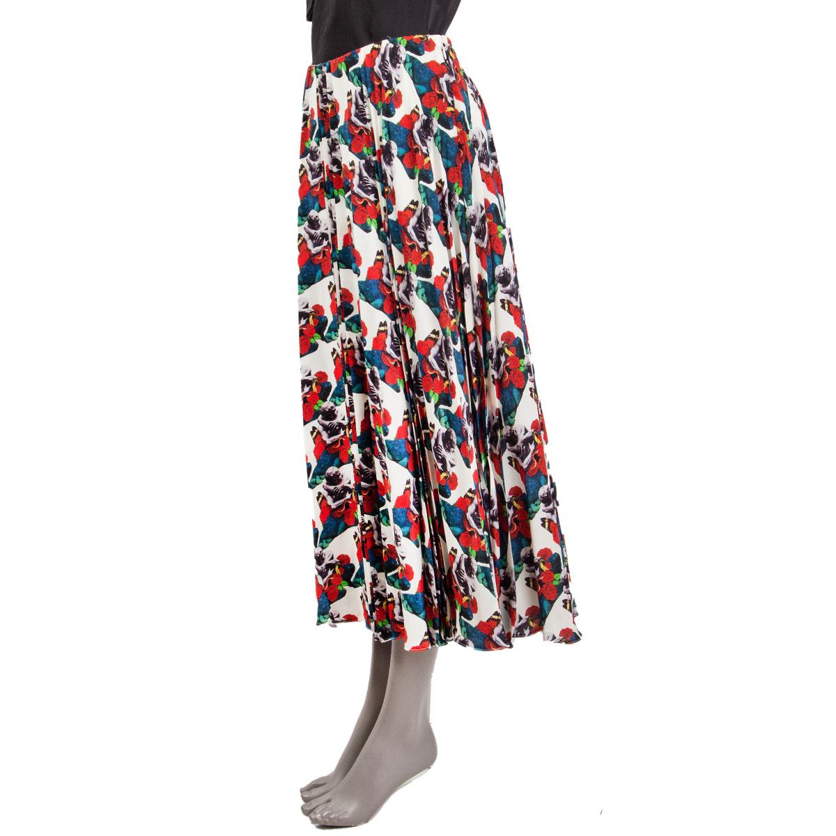 100% authentic Valentino x Undercover lovers print pleated knee-lenght skirt in off-white silk (missing content tag) with multicolored print. Closes with a concealed zipper on the side. Lined in white silk (missing tag). Has been worn and is in