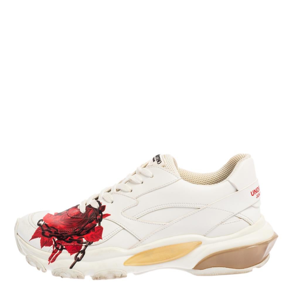 These sneakers by Valentino are meant to be flaunted. Crafted from leather, they feature a gorgeous chain rose design. The pair is completed with lace-ups and rubber soles. Own them today and step out in style. Amp up your look with these trendy