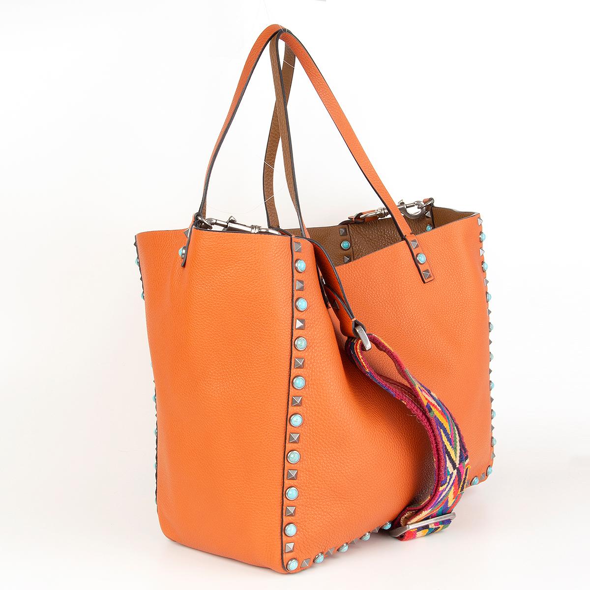 Orange VALENTION orange tan ROLLING ROCKSTUD REVERSIBLE MEDIUM TOTE Bag