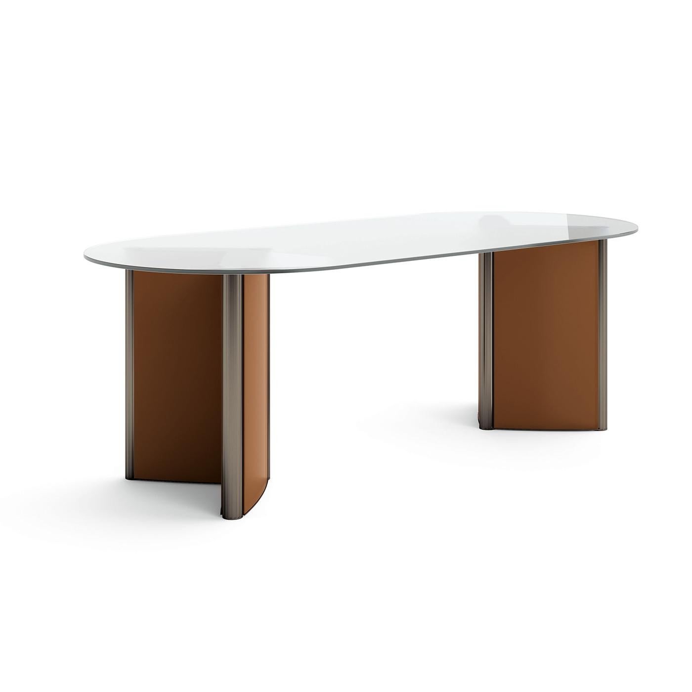Designed for presidential offices, this desk's large scale conveys a sense of importance. The soft lines of its rope-colored leather desktop contrast the sharp edges of its dark Canaletto-walnut legs, making it extremely modern, sophisticated and