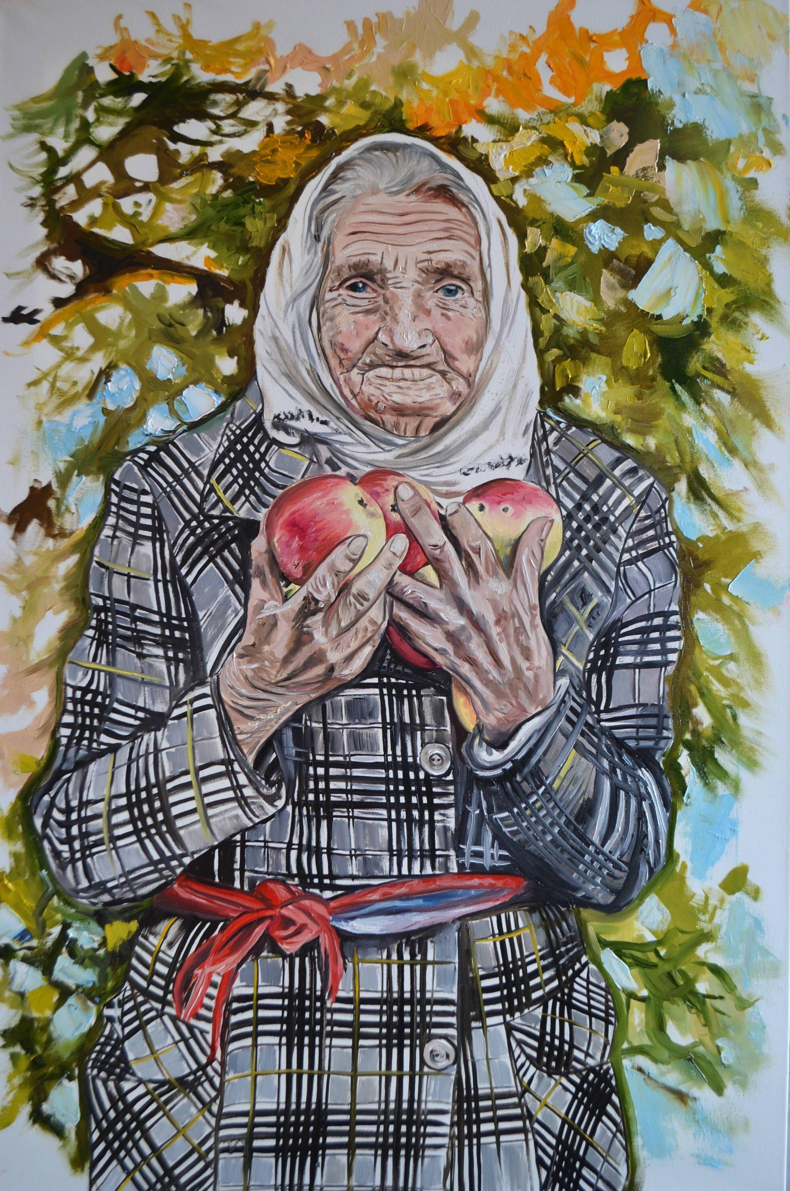 This old woman is a 92-year-old Ukrainian who meets Ukrainian soldiers who liberated her village from Russian invaders. She gives the soldiers what is abundant - apples from her garden. The photo of this woman with kind, penetrating and trusting
