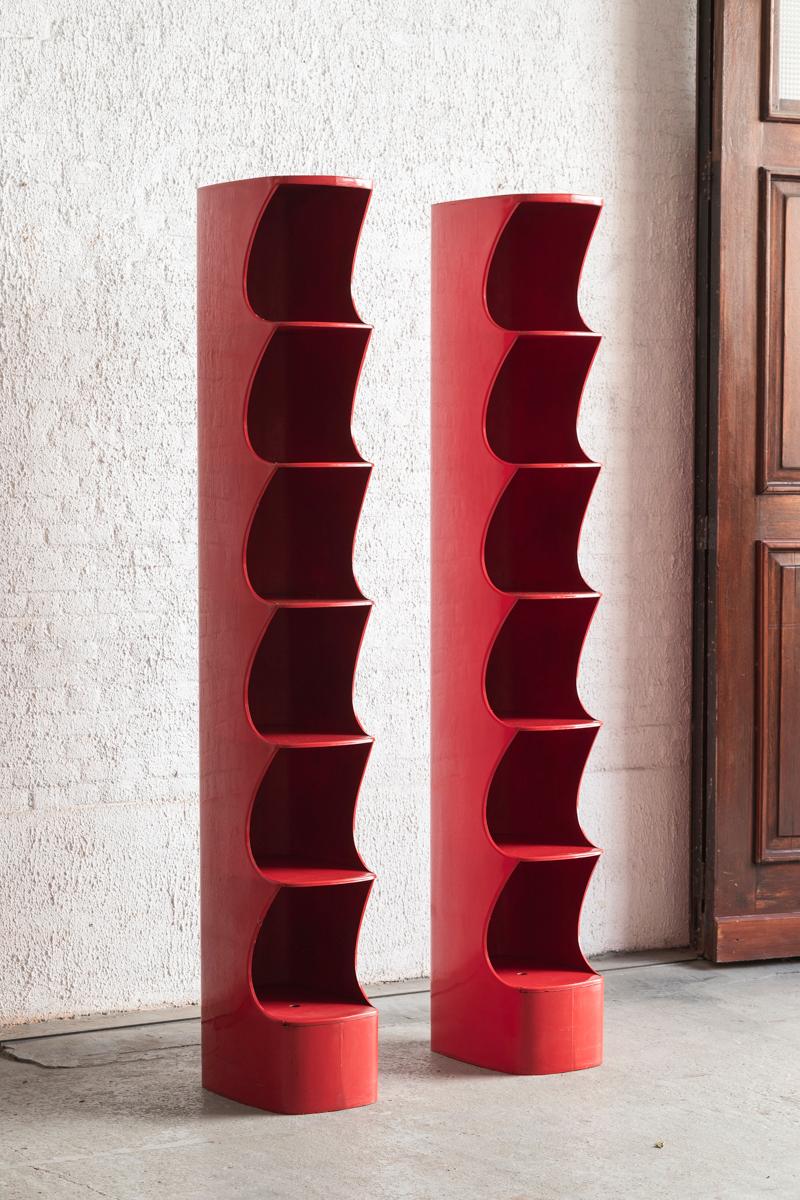 Totem shelving units, designed by Valeric Doubroucinskis and produced for Rodier in France during the 1970’s. This is not only the red edition but also the biggest edition with 6 shelves on each pole. The fiberglass has some signs of use on the