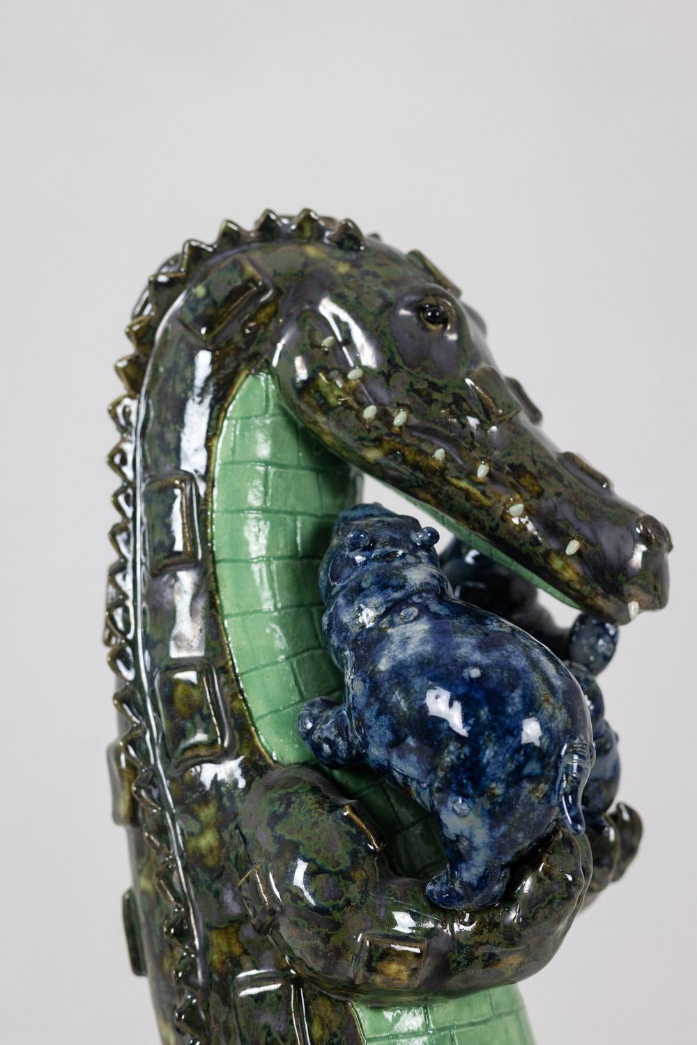 Valérie Courtet.

Sculpture in chamotte stoneware representing a crocodile carrying hippos.

Work of a contemporary French artist.

Dimensions: H 56 x W 30 x D 22 cm

Reference: LS64161809P