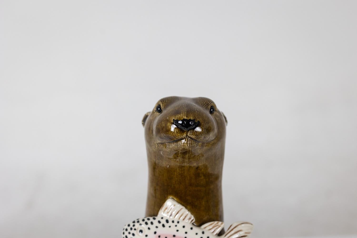 French Valérie Courtet. Otter holding a fish. Contemporary.